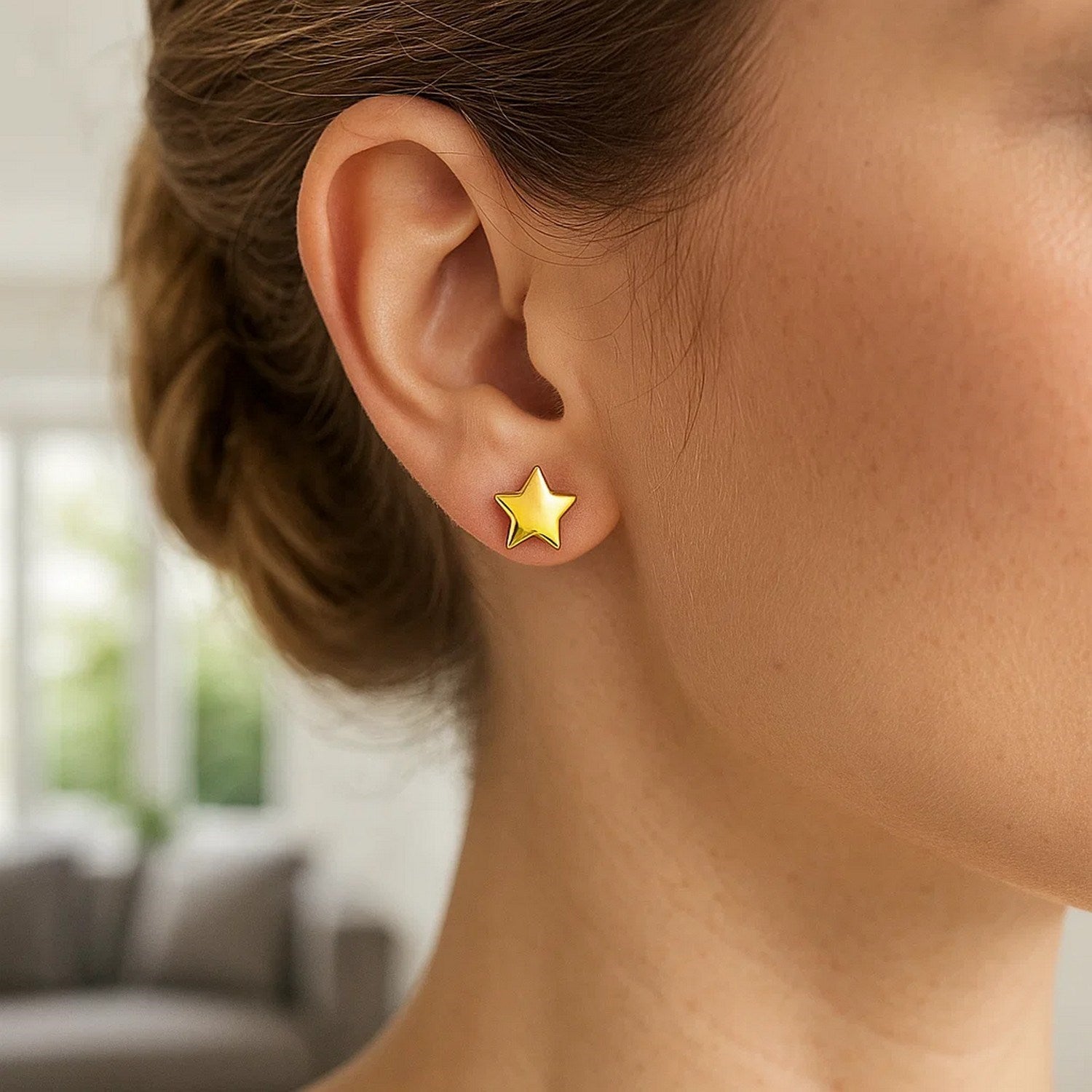 14k yellow gold star post earrings, modern design, 6.5mm, perfect for adding a touch of luxury to any outfit.