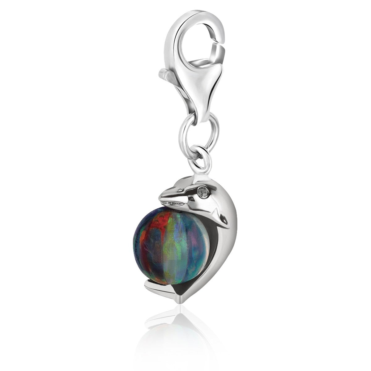 Sterling silver dolphin charm with opal-accented ball, elegant design, perfect for charm bracelets or necklaces.
