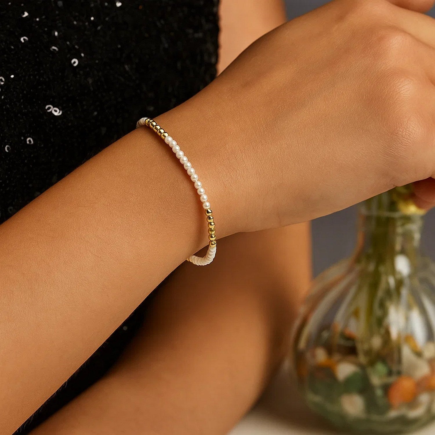 14k yellow gold high polish bracelet featuring elegant freshwater pearl pallina beads for a refined look.