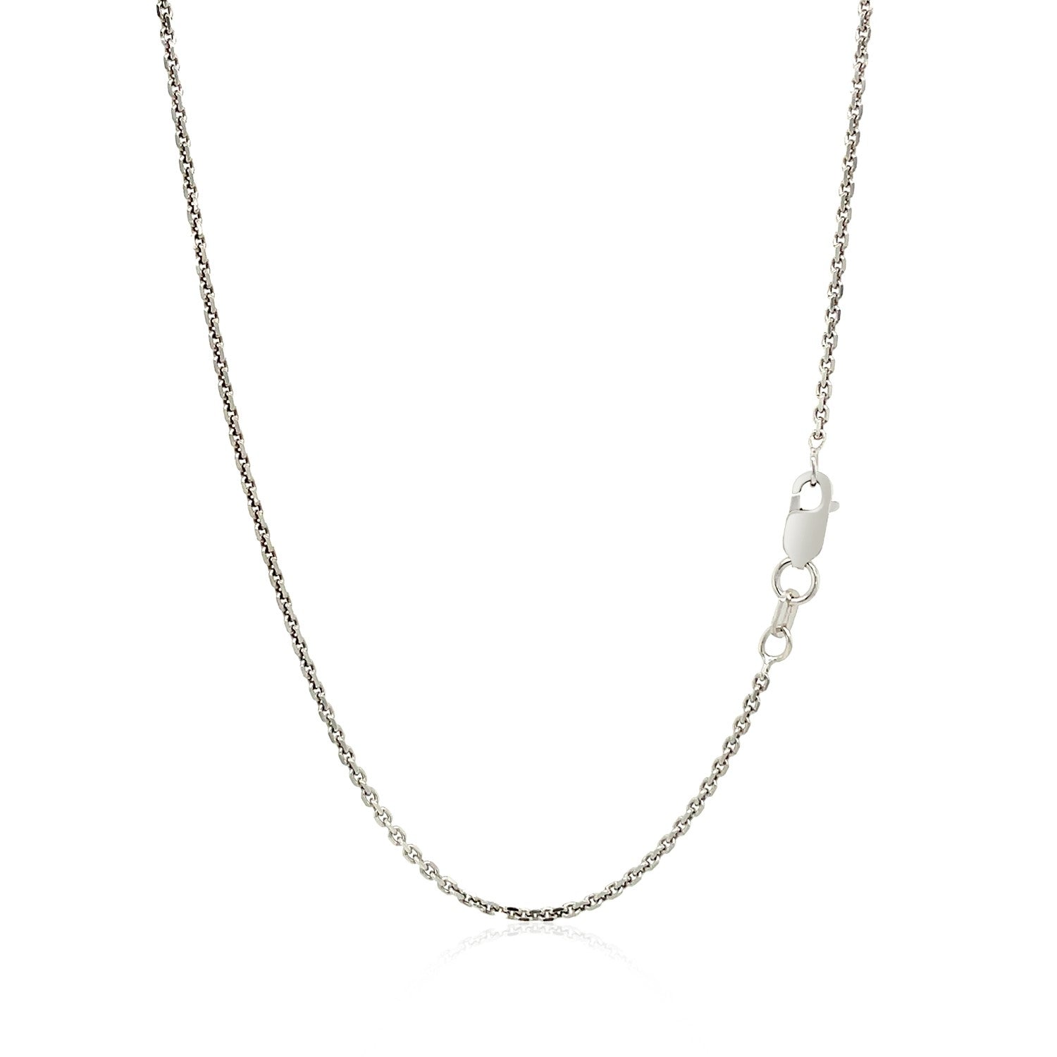 Elegant sterling silver and 14k yellow gold sand dollar pendant with a delicate chain, showcasing coastal-inspired design.