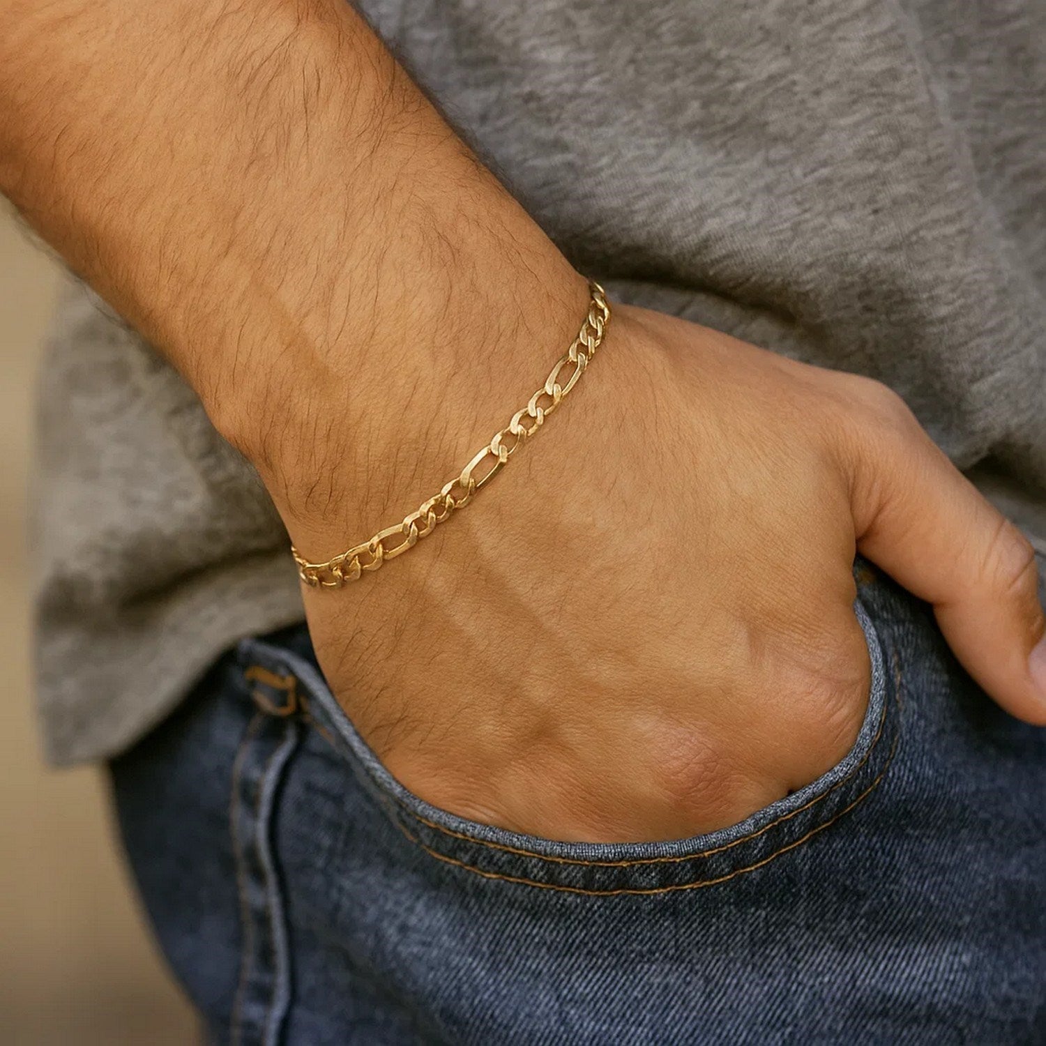 Elegant 10k yellow gold solid Figaro bracelet featuring a 4.50 mm design, perfect for sophisticated styling.