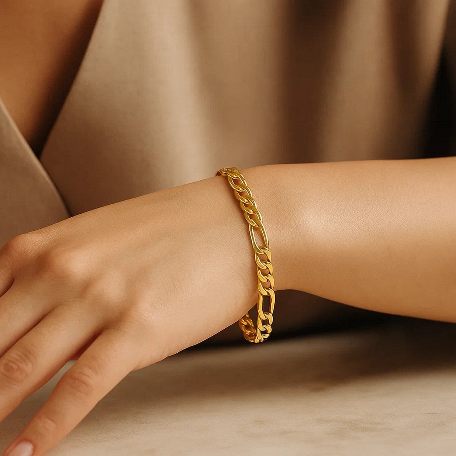 Elegant 10k yellow gold solid Figaro bracelet featuring a 4.50 mm width, showcasing timeless luxury and craftsmanship.
