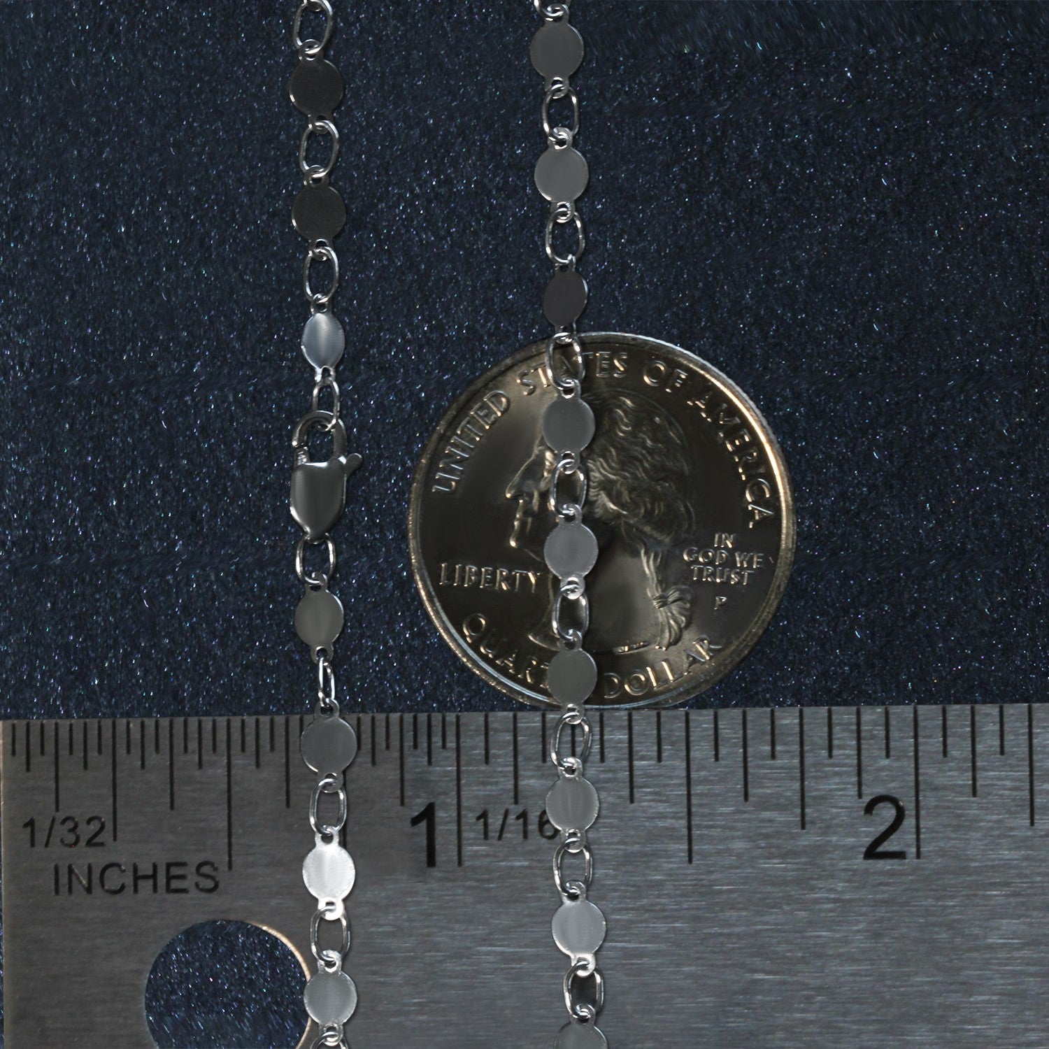 14k white gold bracelet featuring polished circles in a modern chain design, perfect for elegant layering.