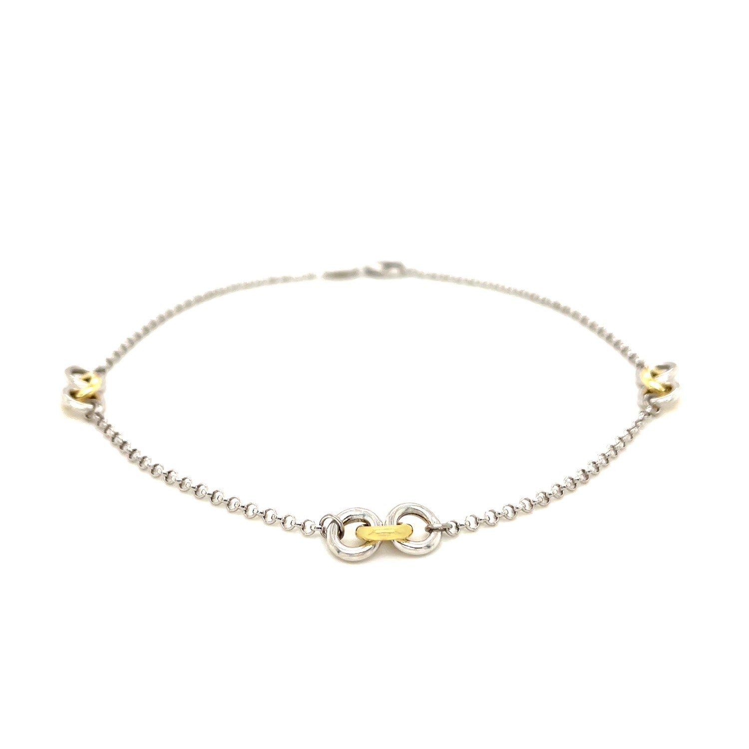 14k yellow gold and sterling silver triple ring anklet with modern design, perfect for luxury jewelry enthusiasts.
