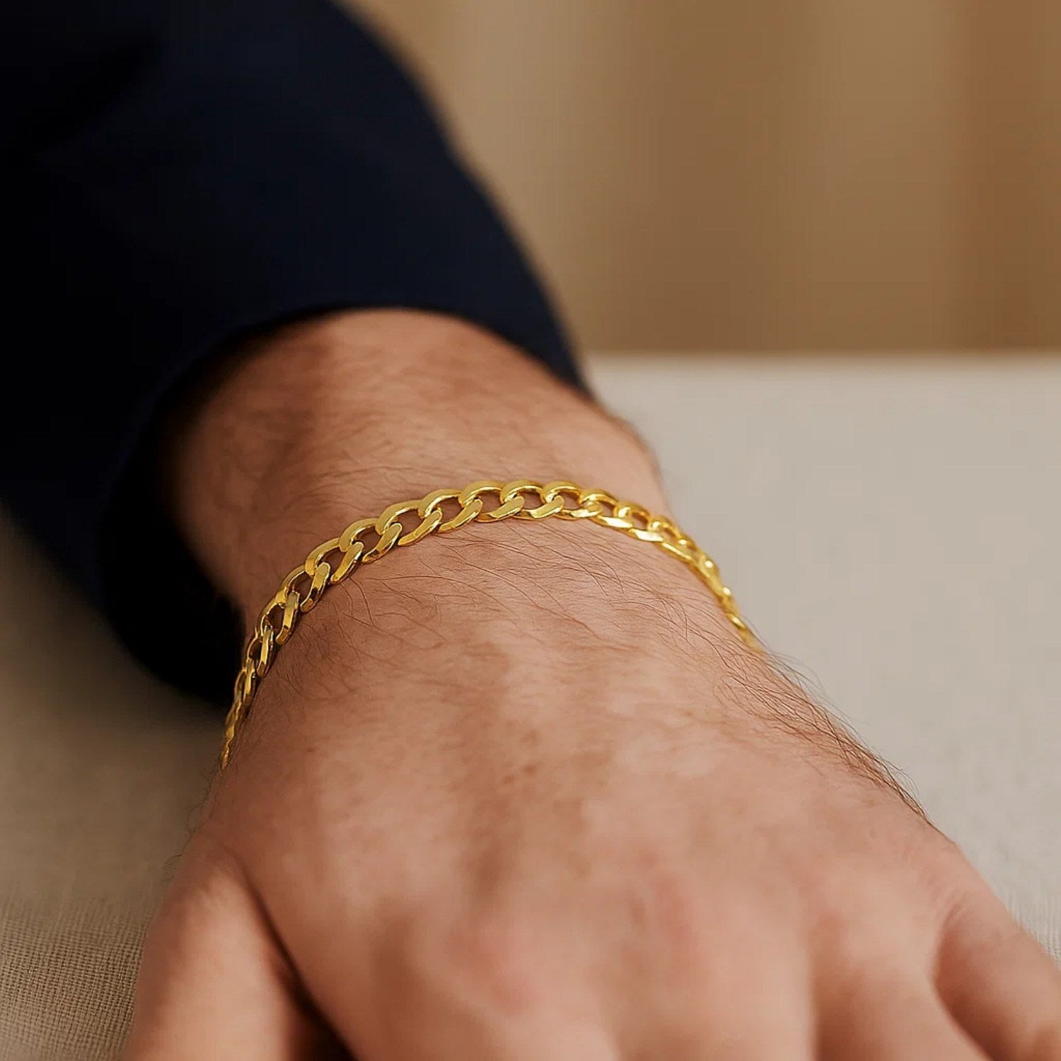 14k yellow gold solid curb bracelet featuring modern chain links, elegantly crafted for a luxurious look.