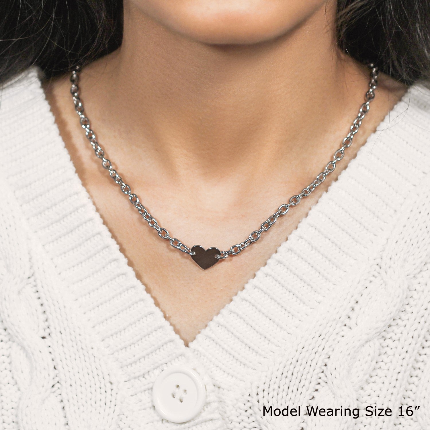 Sterling silver rhodium plated chain bracelet featuring a modern flat heart motif station for elegant styling.