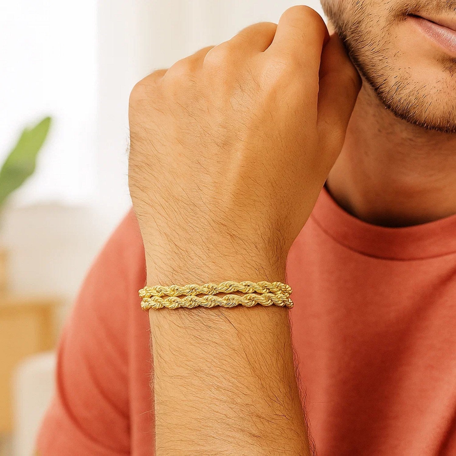 14k yellow gold dual row rope bracelet, elegantly crafted for a luxurious touch, showcasing refined design and quality.