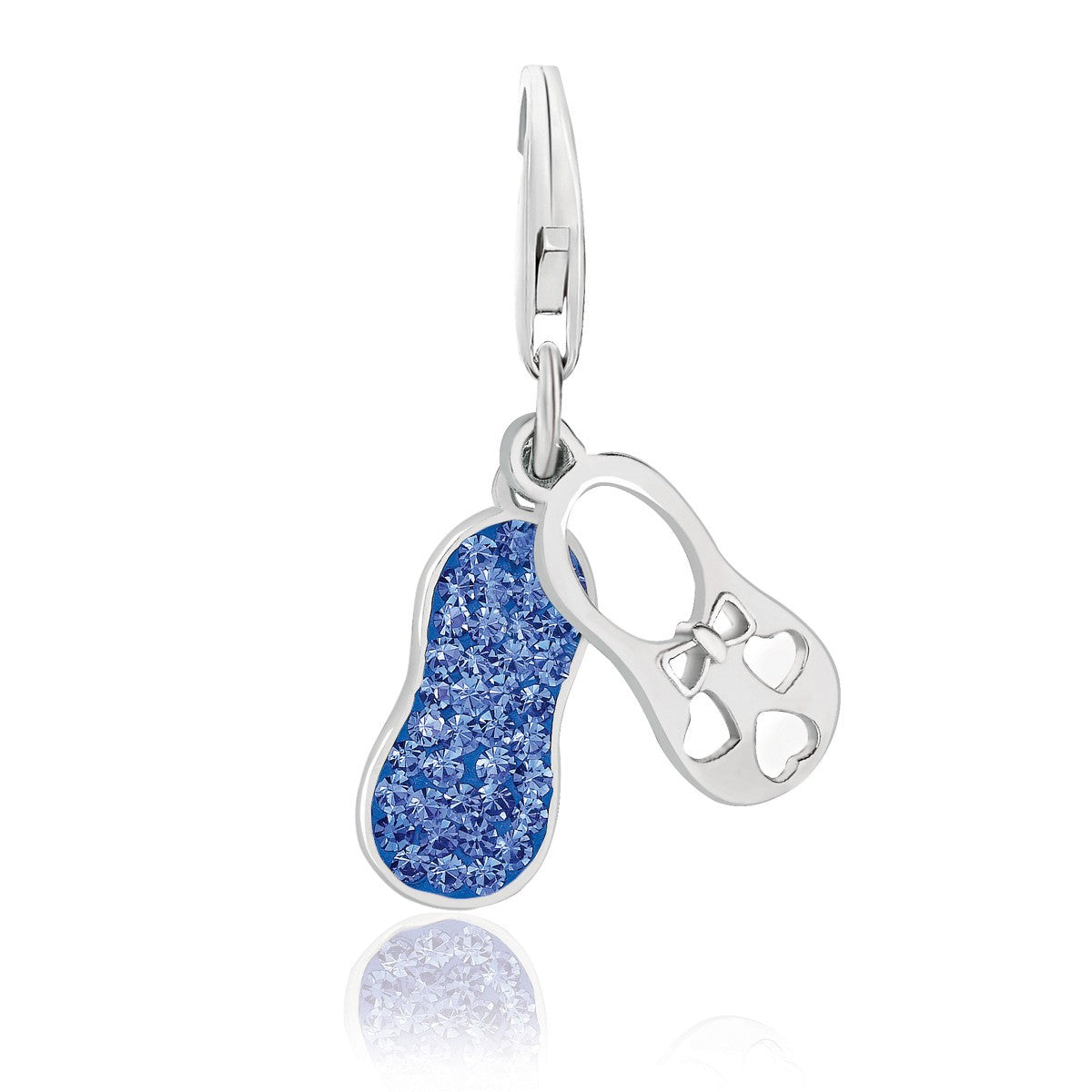 Sterling silver dual bootie charms adorned with blue tone crystals, exuding elegance and luxury craftsmanship.