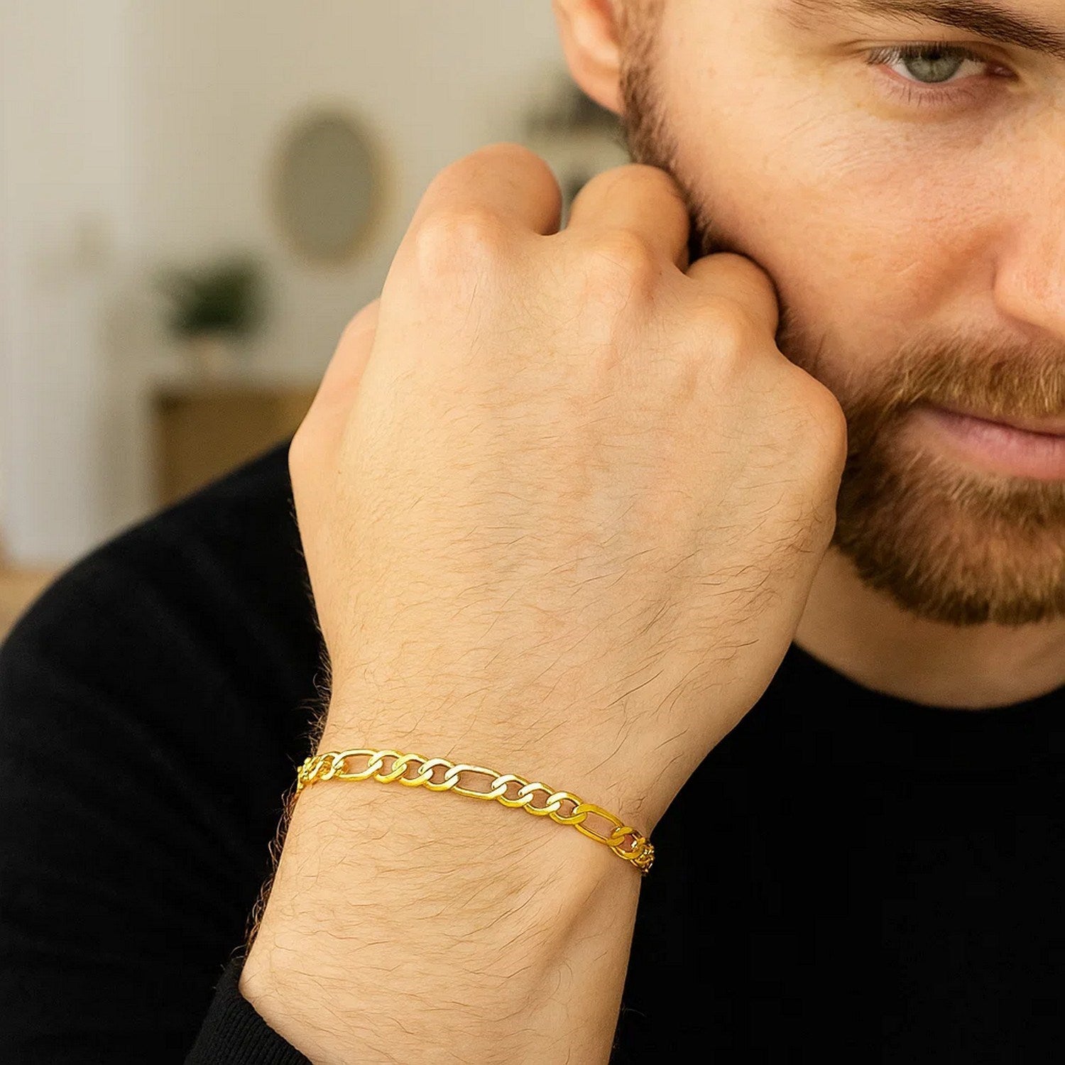 14k yellow gold solid Figaro bracelet with modern link design, showcasing elegance and timeless luxury.