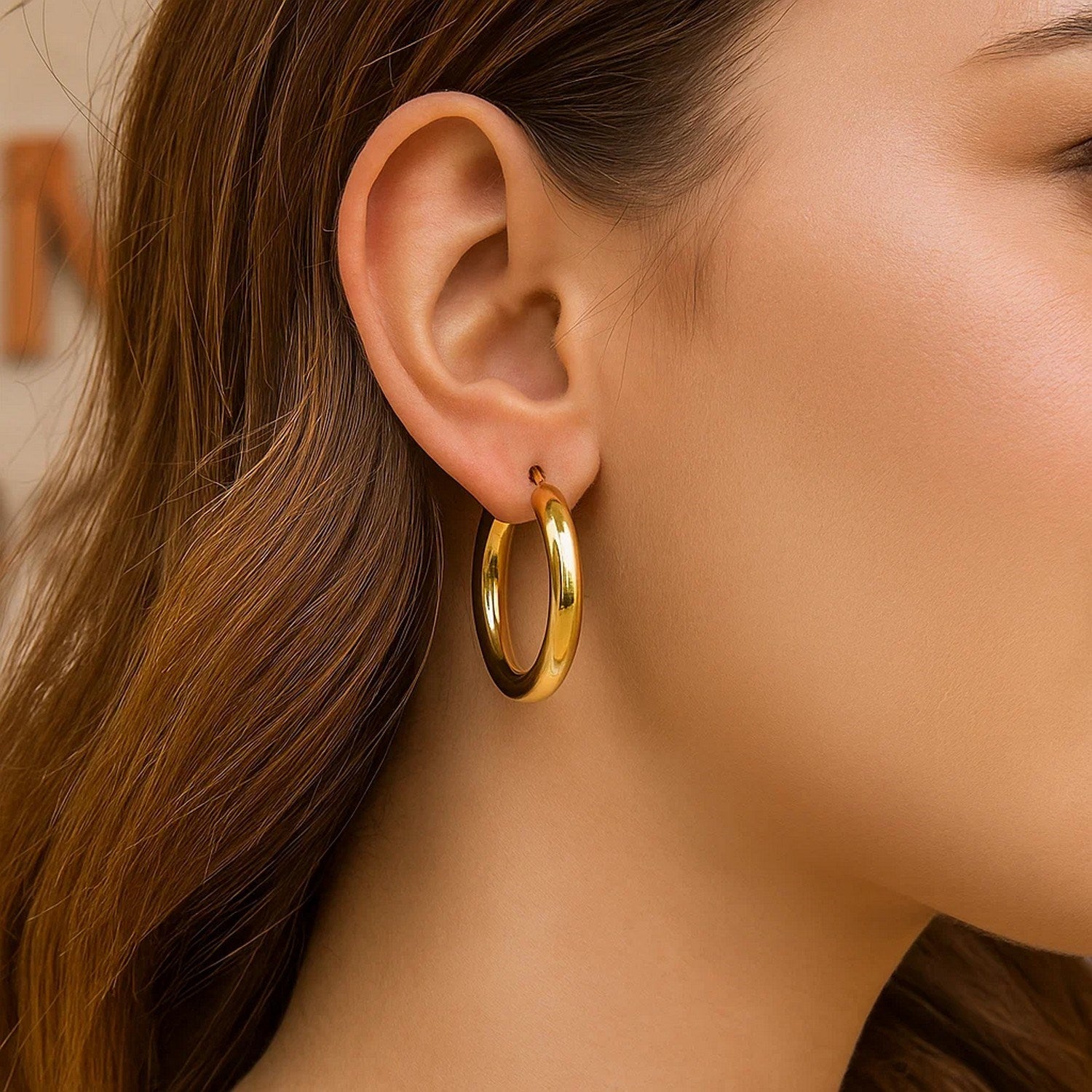 14k yellow gold polished hoop earrings, modern design, elegant 5x30 mm size, perfect for any luxury occasion.