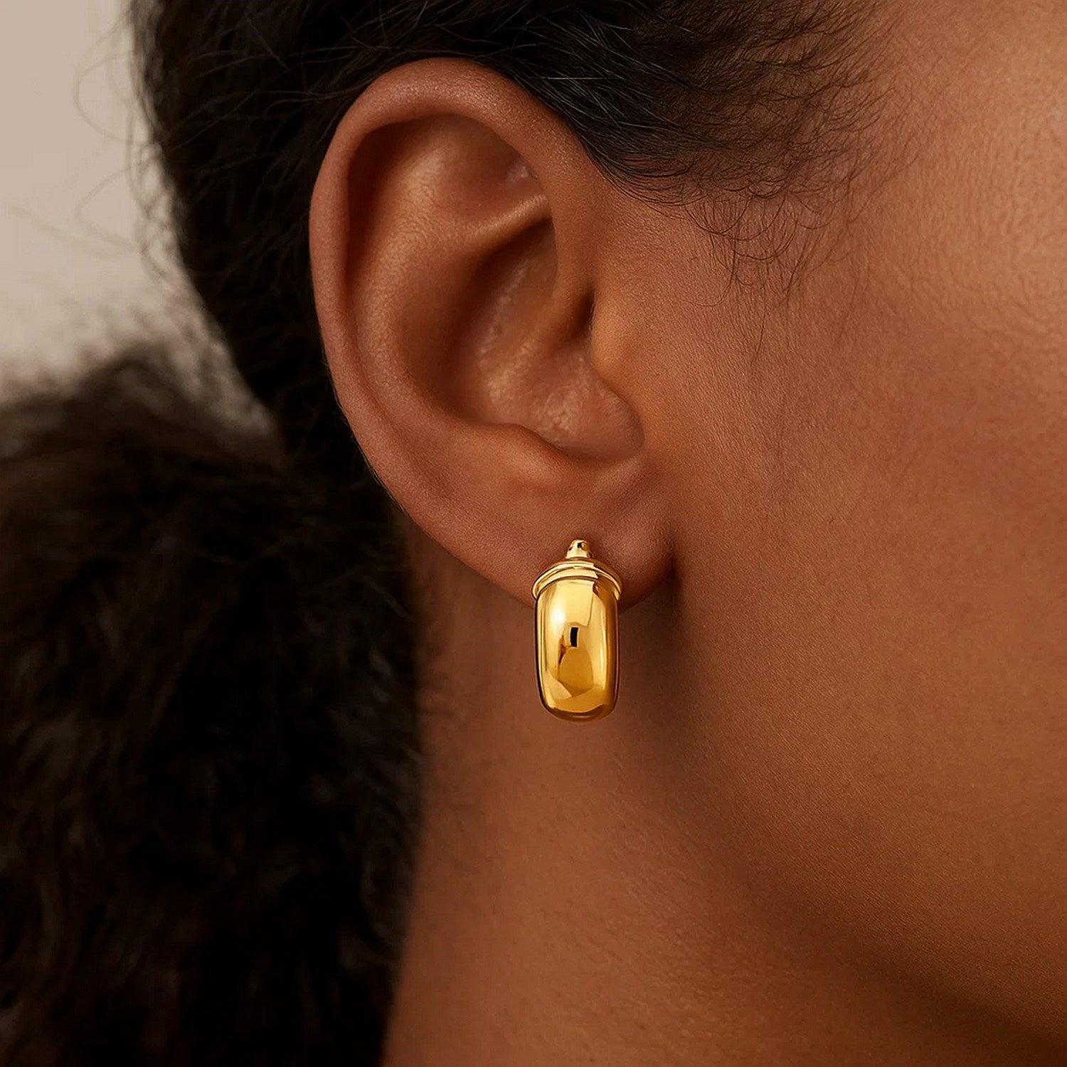 14k yellow gold polished wide small hoop earrings, showcasing minimalist elegance and timeless luxury.