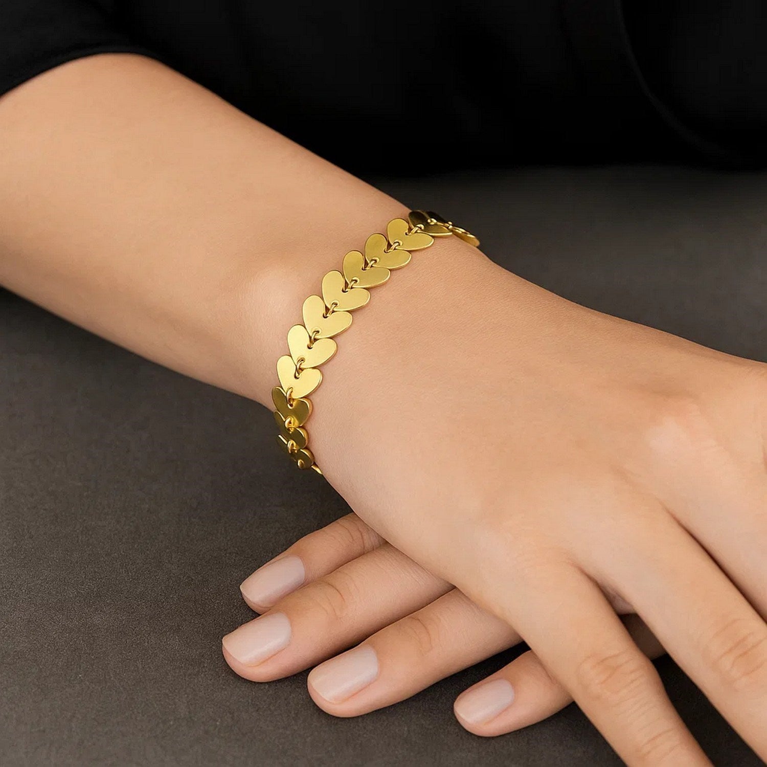 14k yellow gold heart link bracelet featuring a modern chain design, perfect for elegant layering or standalone wear.