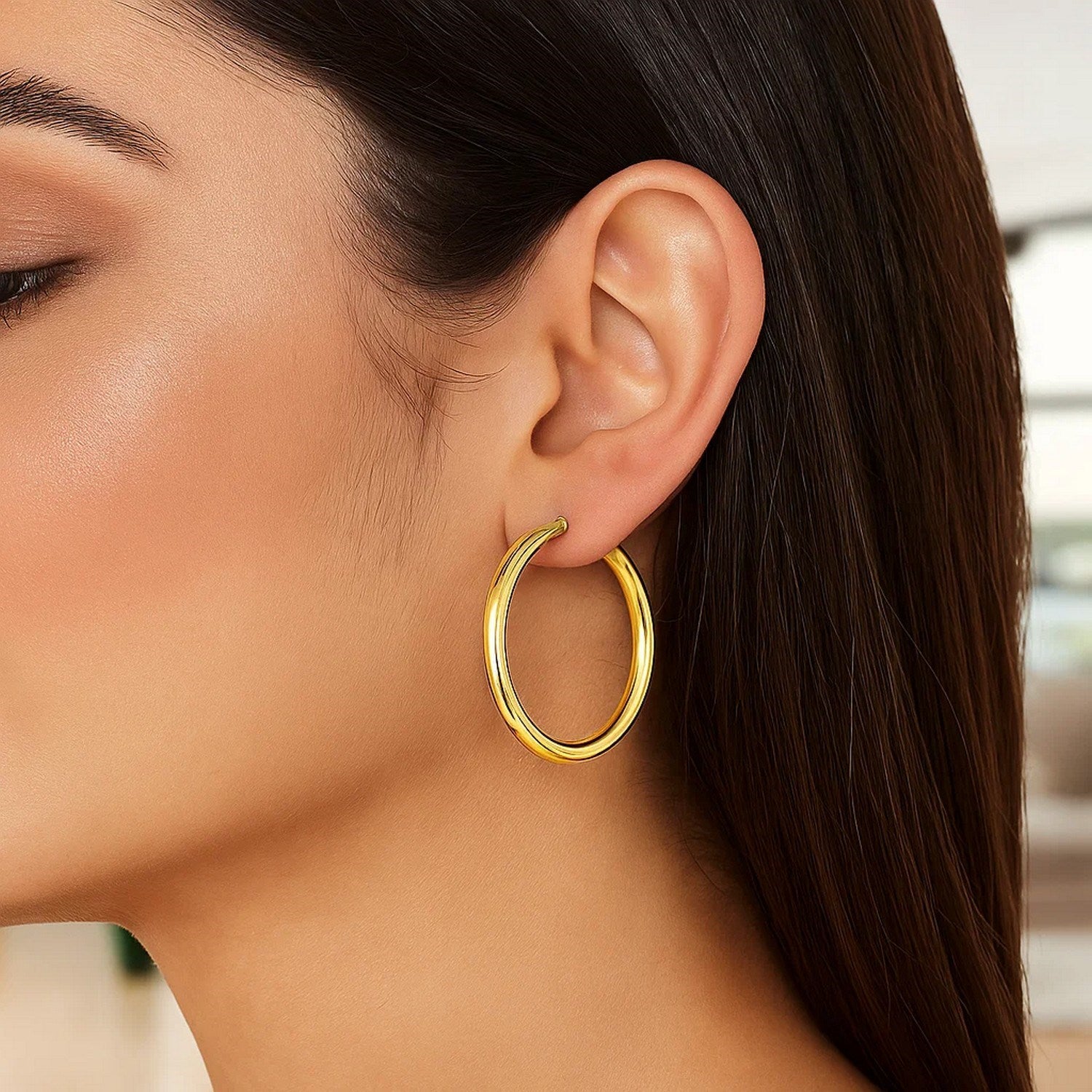 14k yellow gold polished hoop earrings, modern design, 4x40mm, showcasing elegance and timeless sophistication.