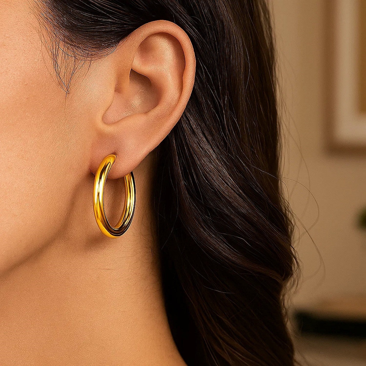 14k yellow gold polished hoop earrings, modern design, elegant shine, perfect for any luxury jewelry collection.
