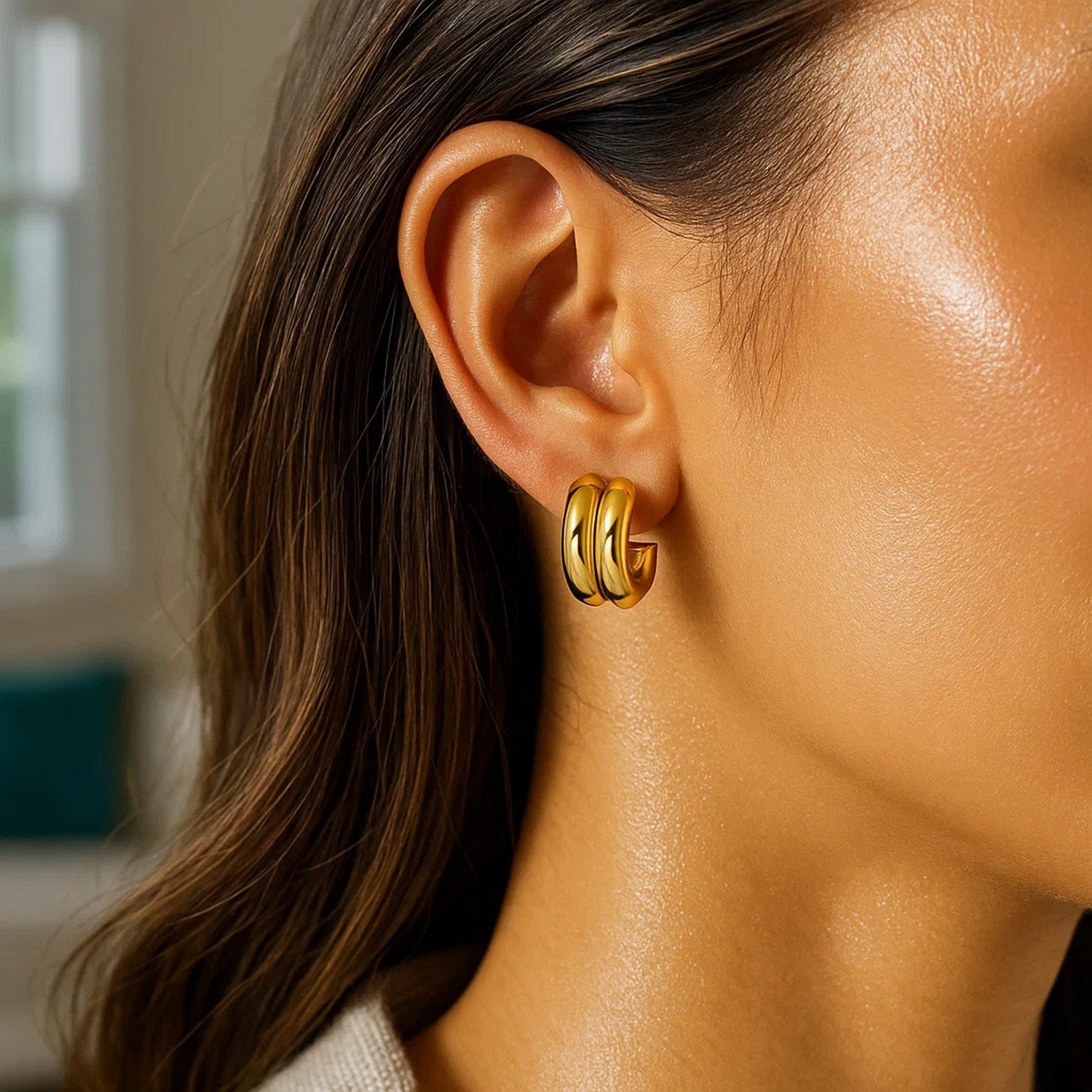 14K yellow gold puffed double row C hoop earrings with a modern design, perfect for elegant occasions.