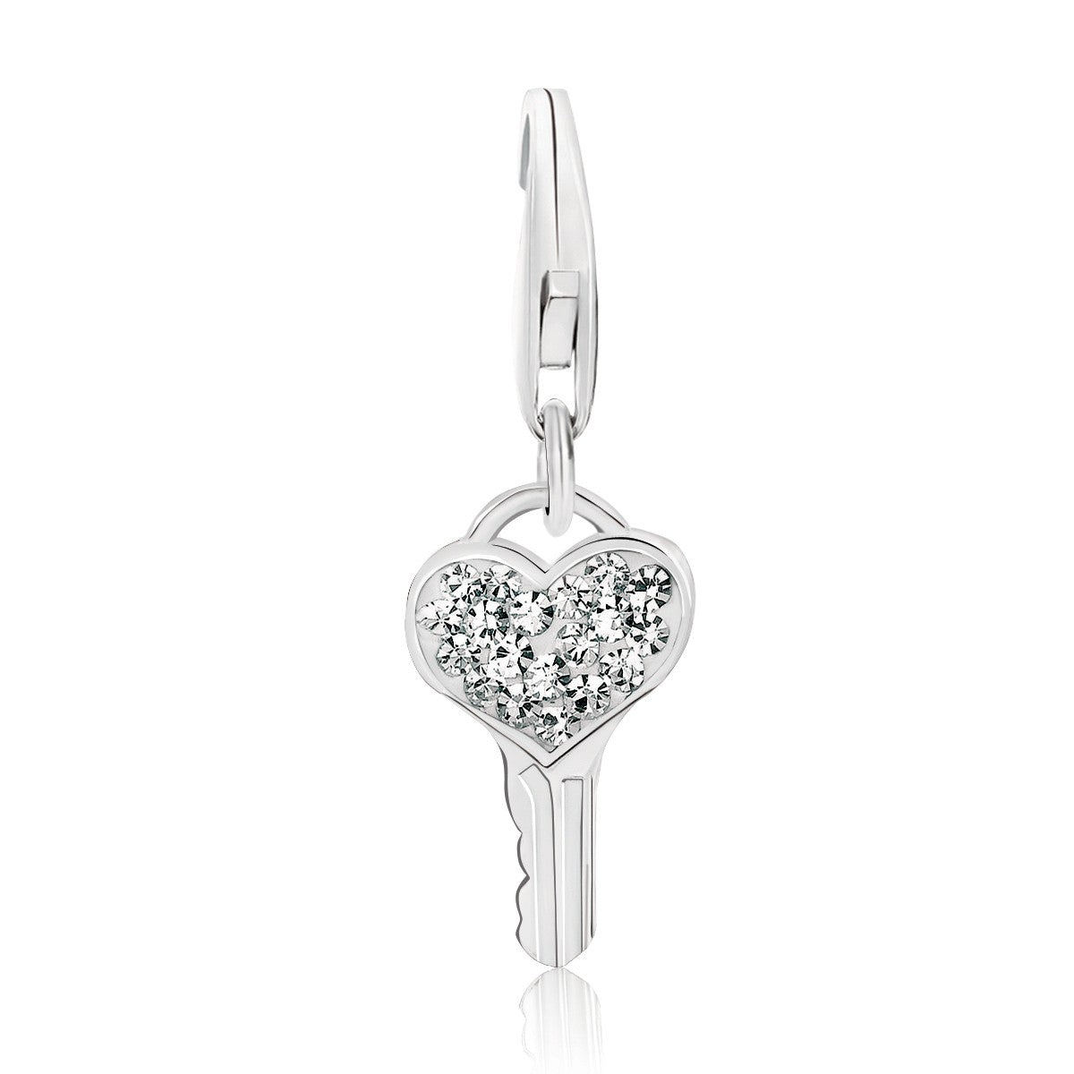 Sterling silver heart key charm adorned with white tone crystal accents for an elegant, luxurious touch.