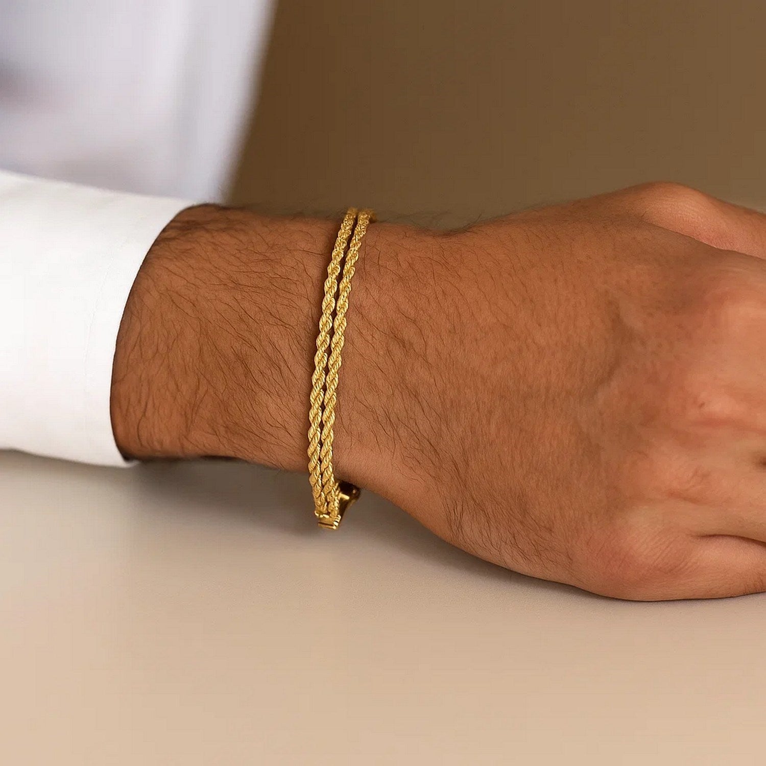 14k yellow gold two-row rope bracelet, elegantly crafted with a luxurious design and a 3.90 mm width.