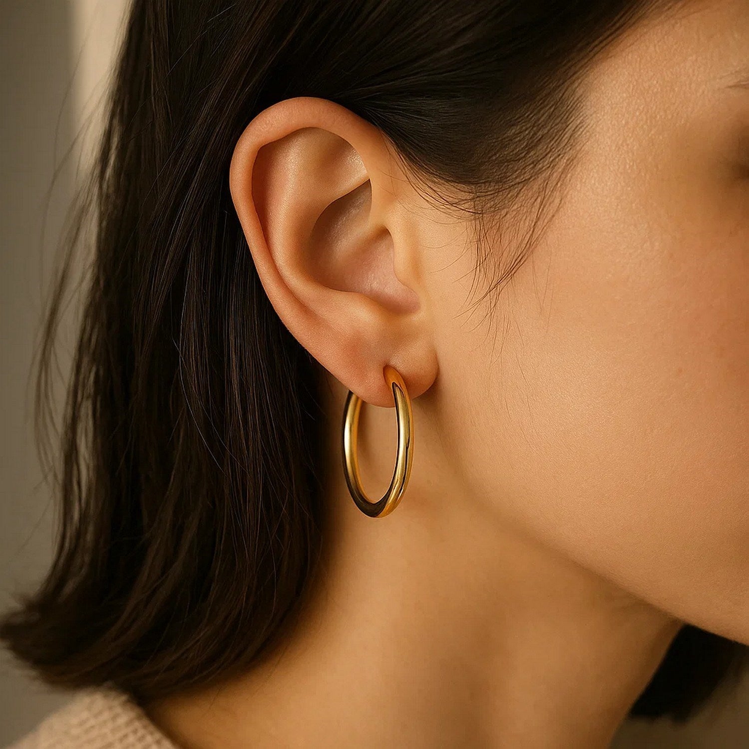 14k yellow gold polished hoop earrings with a modern design, measuring 3x30mm for an elegant touch.