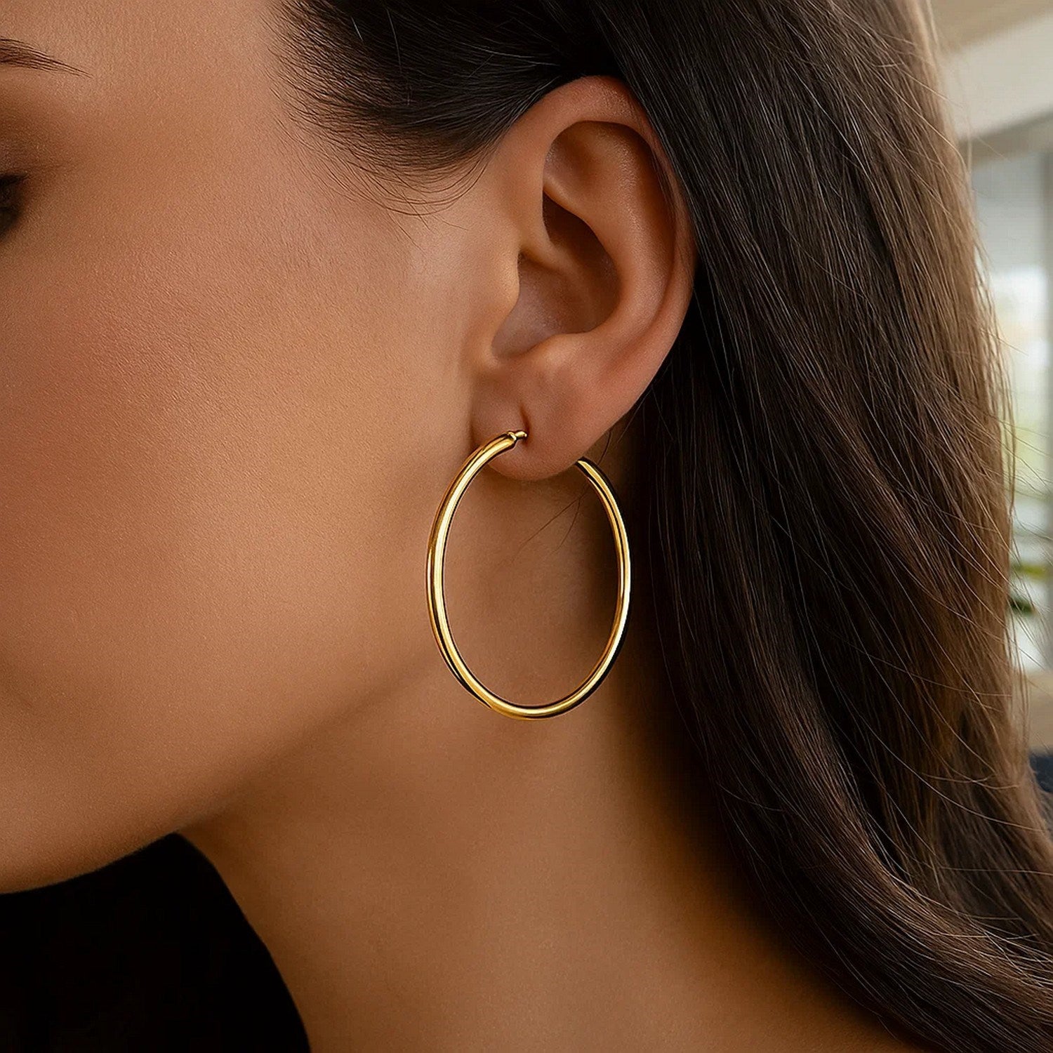 14k yellow gold polished hoop earrings, modern design, 3x50mm, perfect for elegant everyday wear.