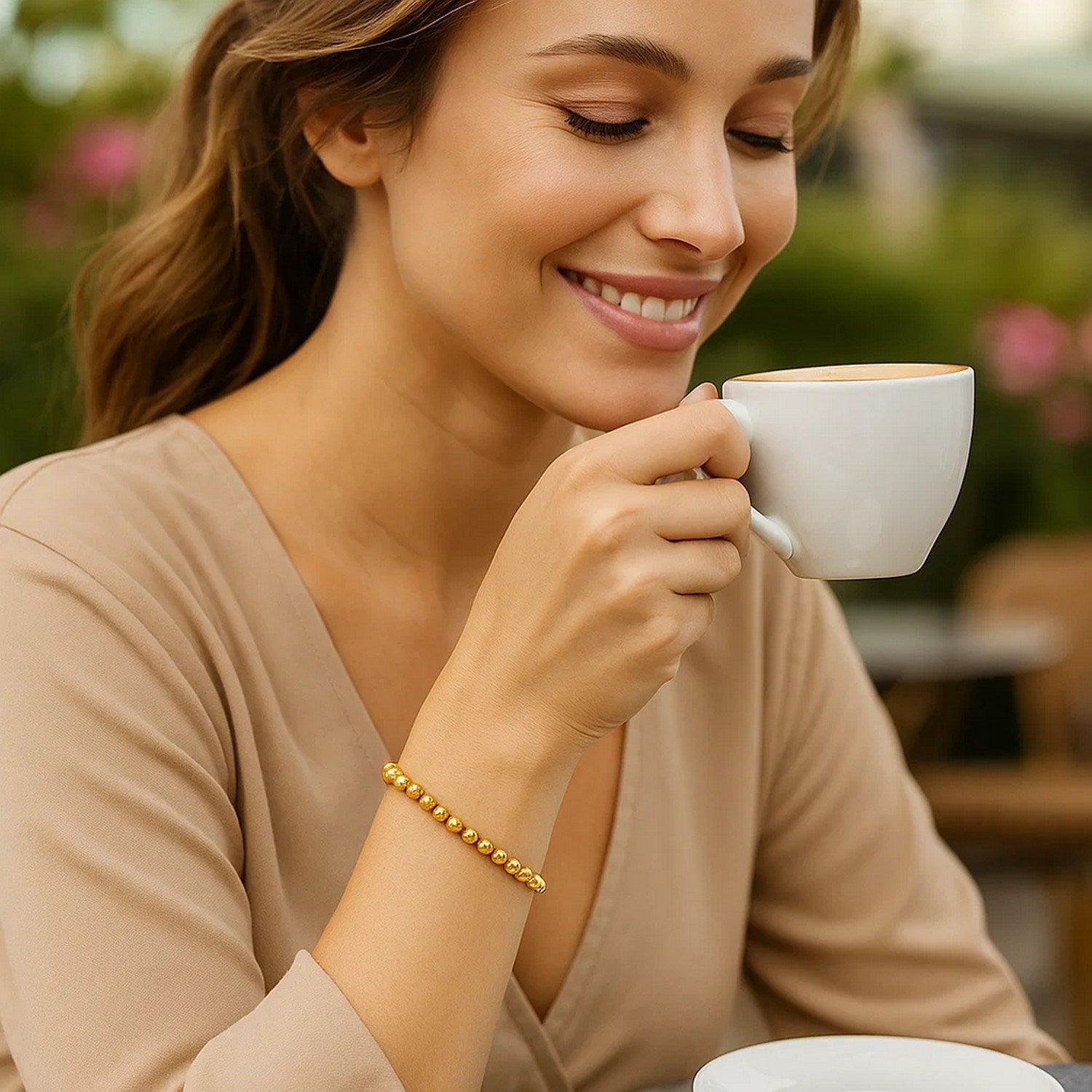 14k yellow gold bead bracelet featuring a modern design with luxurious 5.00 mm beads for an elegant touch.