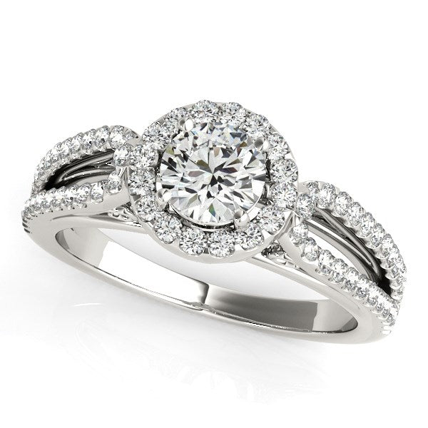 14k white gold diamond engagement ring featuring a teardrop split shank and halo prong setting, modern elegance.