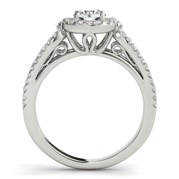 14k white gold diamond engagement ring with teardrop split shank and halo, showcasing modern elegance and brilliance.