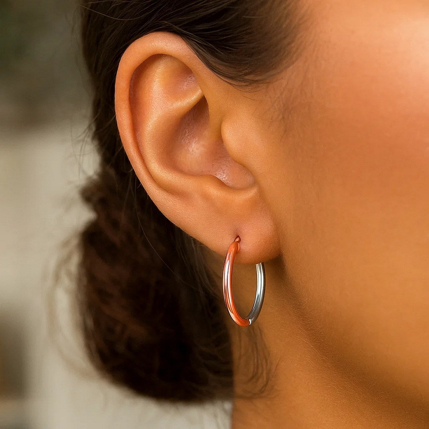 14k rose and white gold modern hinged hoop earrings showcasing exquisite craftsmanship and elegant design.