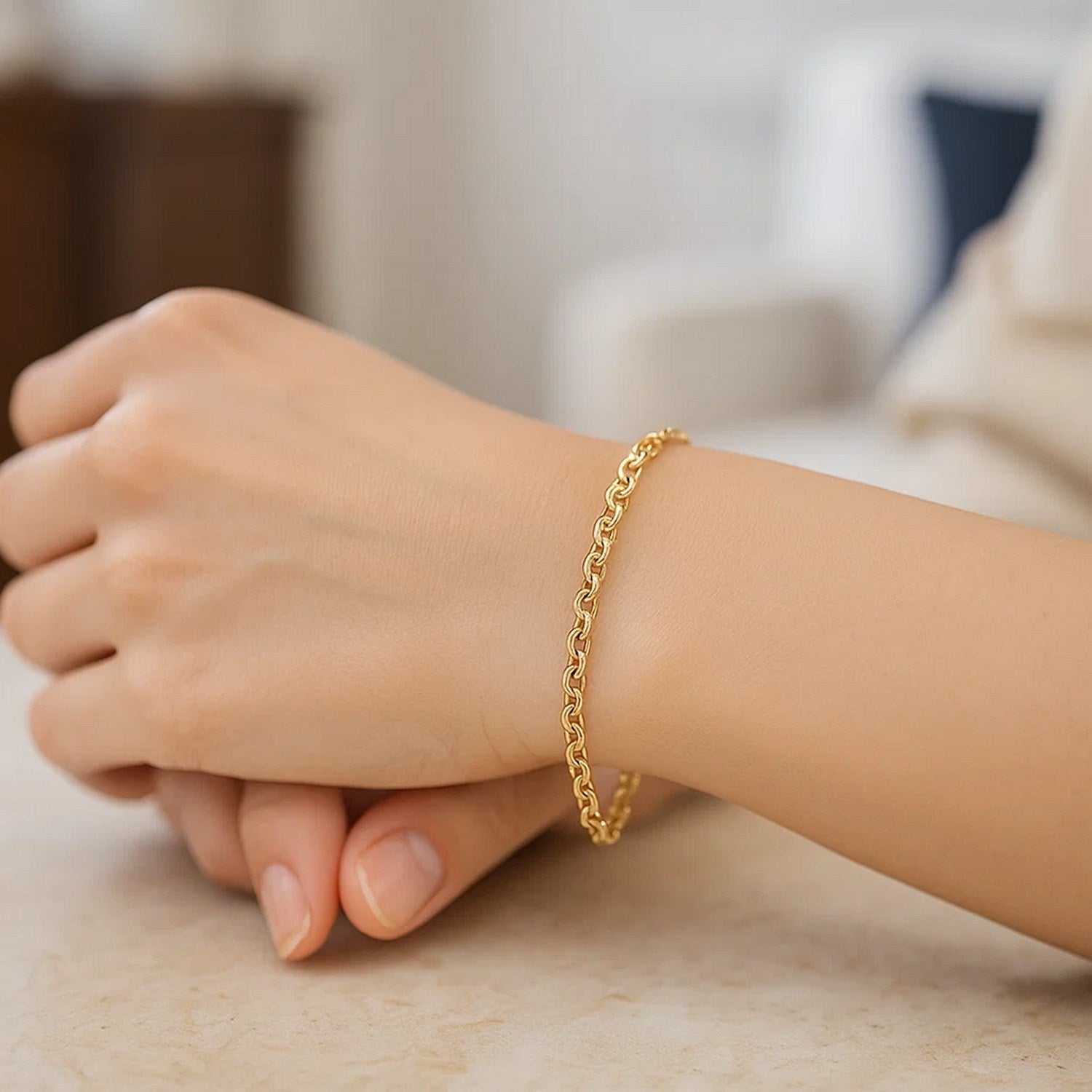 14k yellow gold rolo bracelet featuring modern link design, perfect for elegant layering or standalone sophistication.