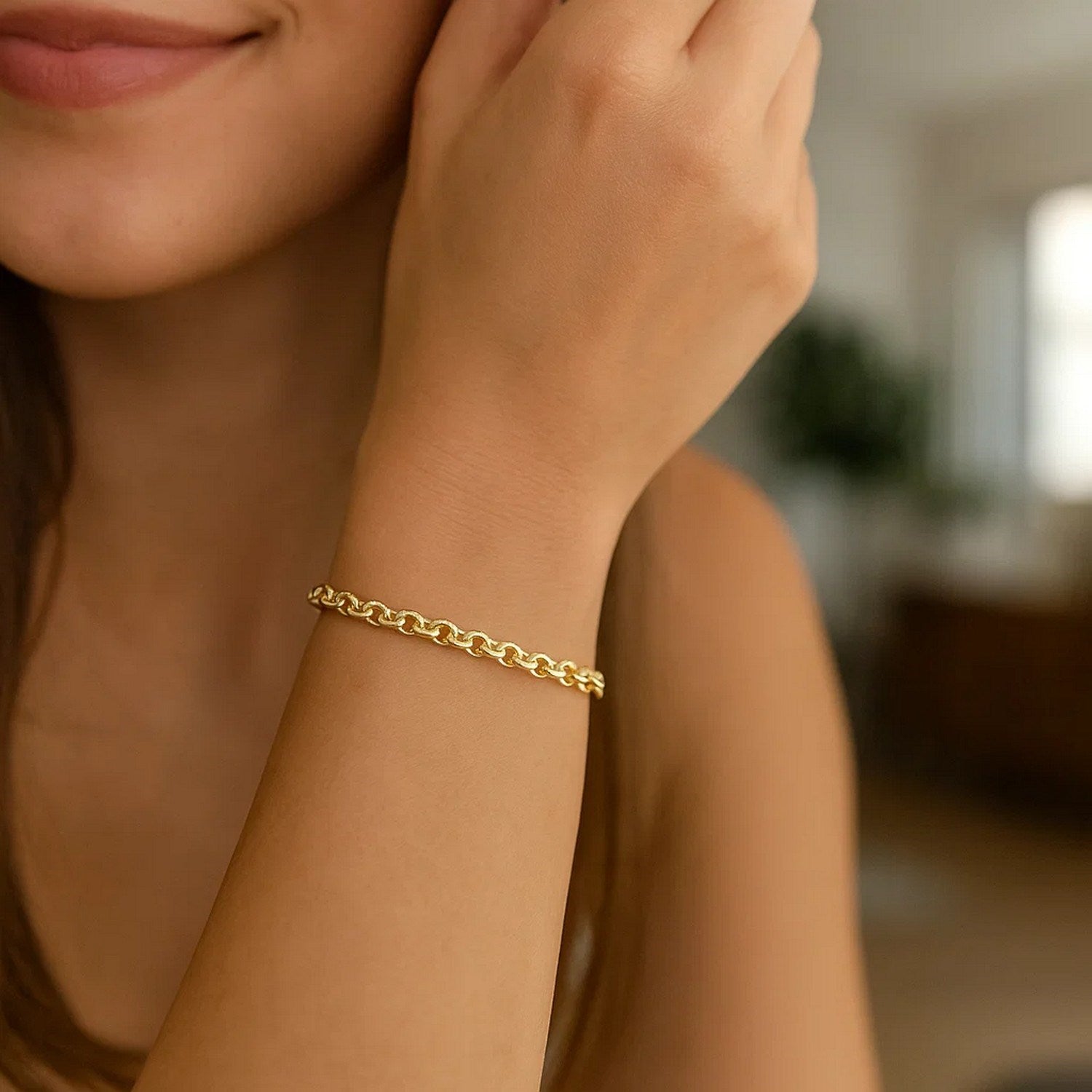 14k yellow gold rolo bracelet featuring modern link design, perfect for elegant layering or solo wear.