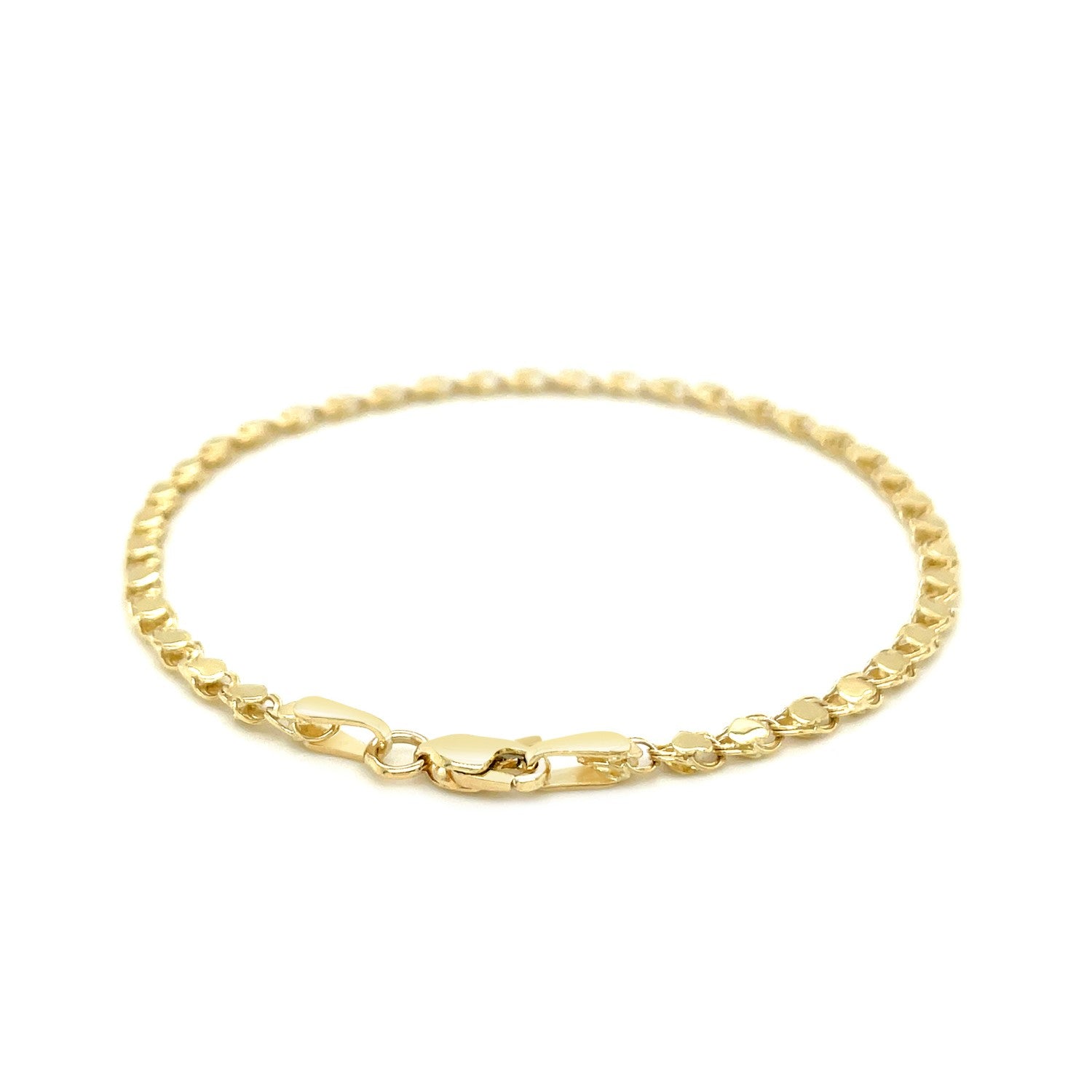 14k yellow gold heart bracelet with modern link design, showcasing elegance and luxury in every detail.