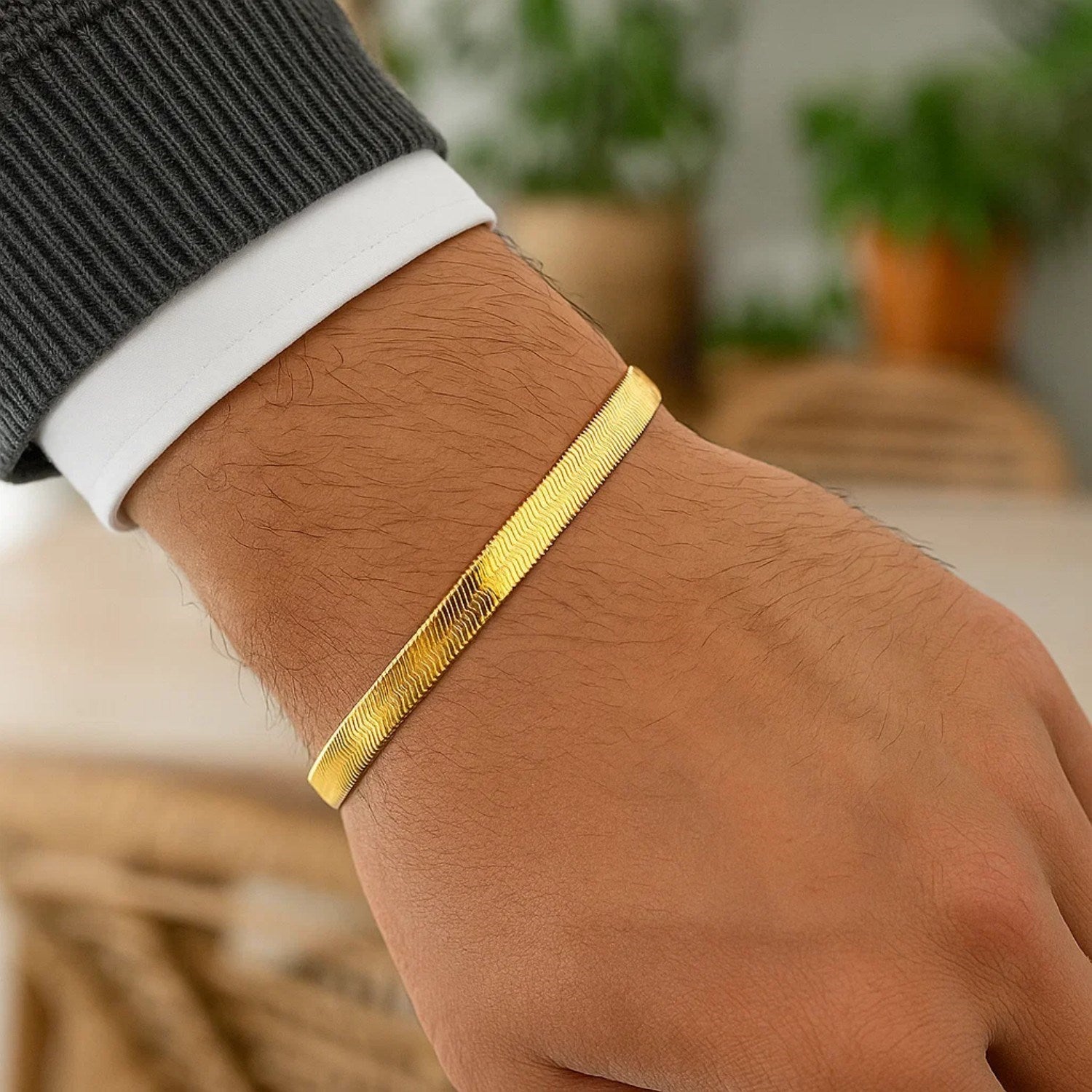 14k yellow gold super flex herringbone bracelet with a modern design and elegant chain detail, perfect for luxury styling.
