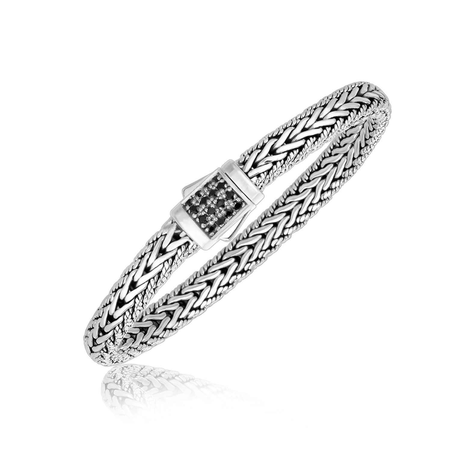 Sterling silver braided men's bracelet featuring black sapphire accents for a modern luxury touch.