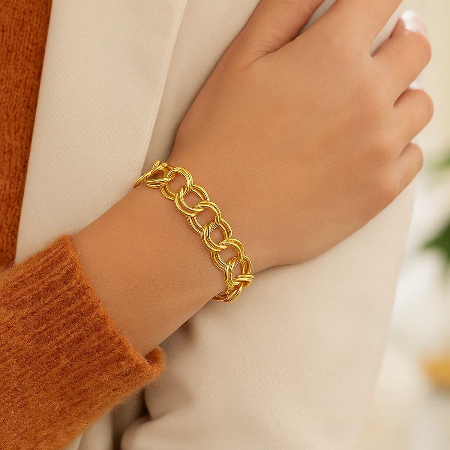 Elegant 14k yellow gold solid double link charm bracelet, featuring a refined design and luxurious finish.