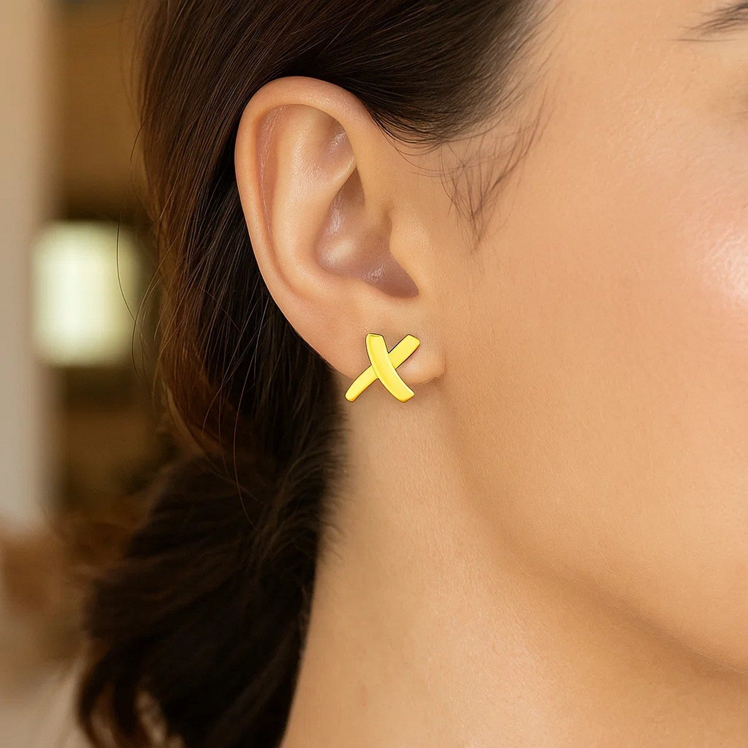 14k yellow gold textured X stud earrings with modern design, perfect for adding elegance to any outfit.