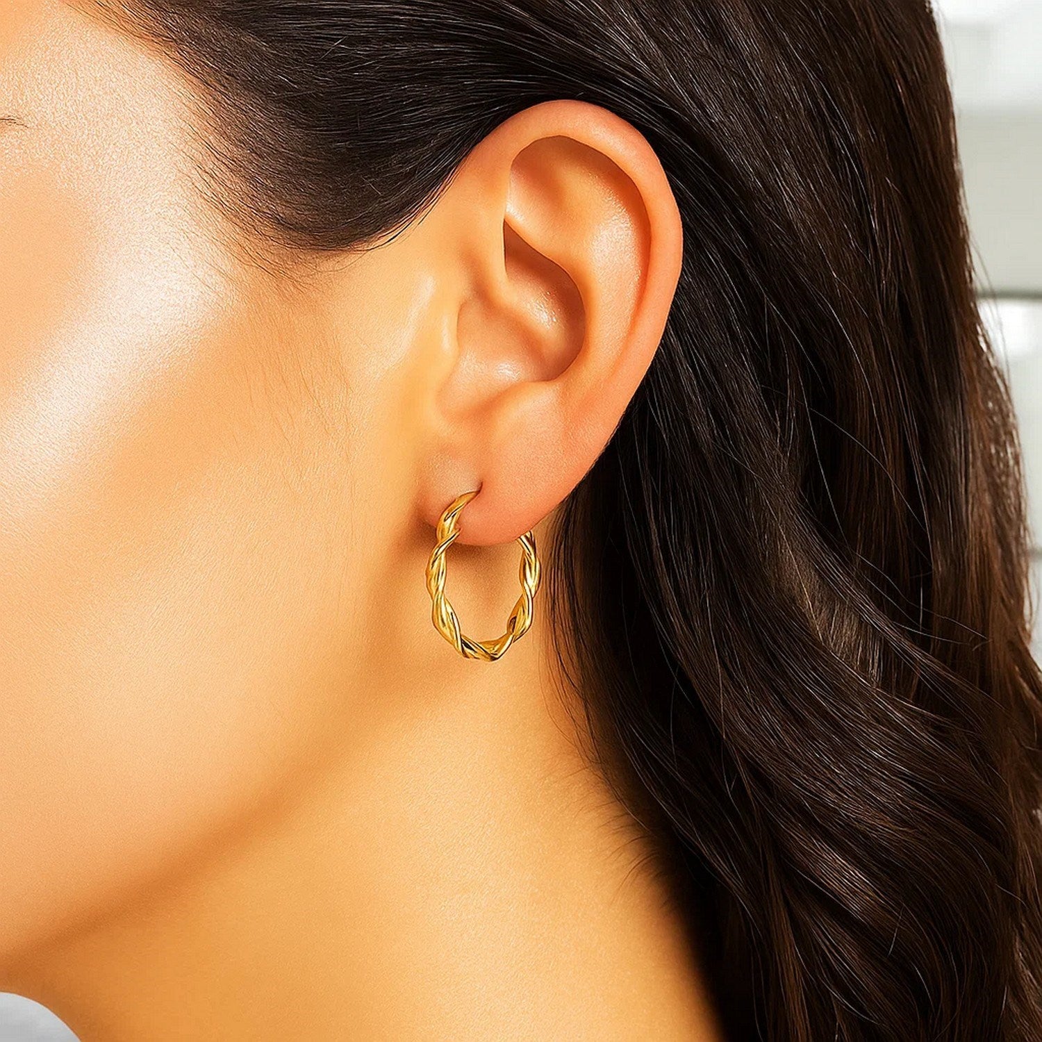 14k yellow gold modern hoop earrings (20mm) showcasing a sleek, polished finish for timeless elegance.