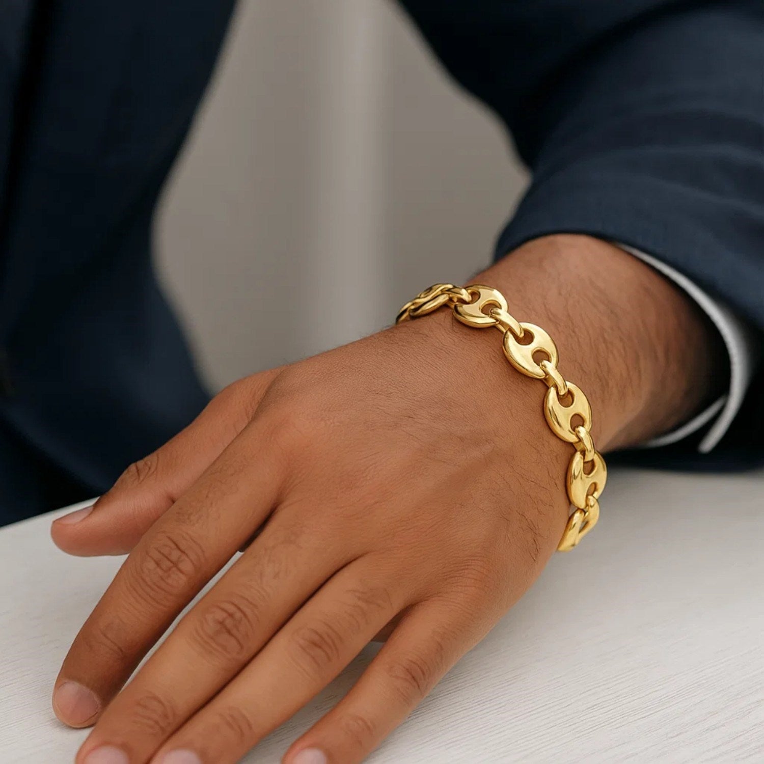 14k yellow gold puffed mariner link bracelet, elegantly designed with 11.00 mm links for a luxurious statement.