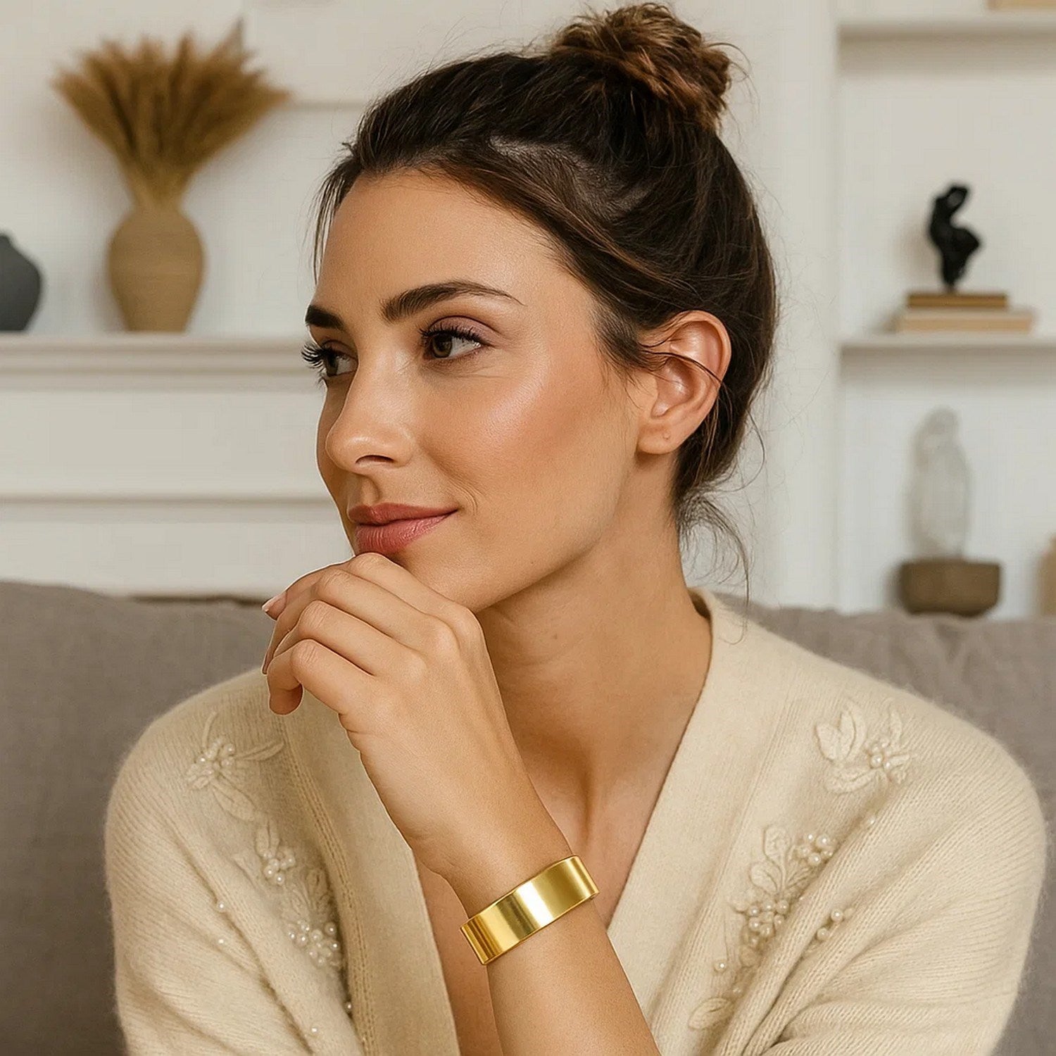 Designer medium width bracelet in 14k yellow gold, showcasing a modern luxury style with a sleek, polished finish.