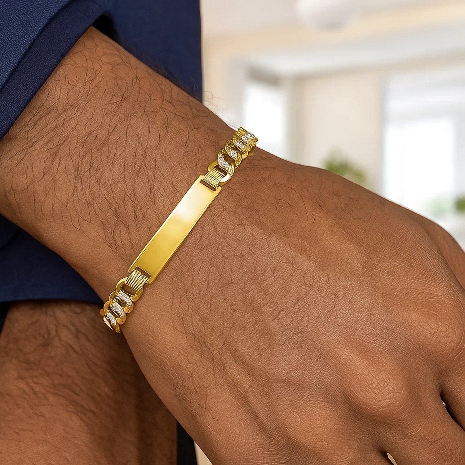 14k two-tone gold men's curb chain ID bracelet featuring white pave accents, elegant link design, and luxurious finish.