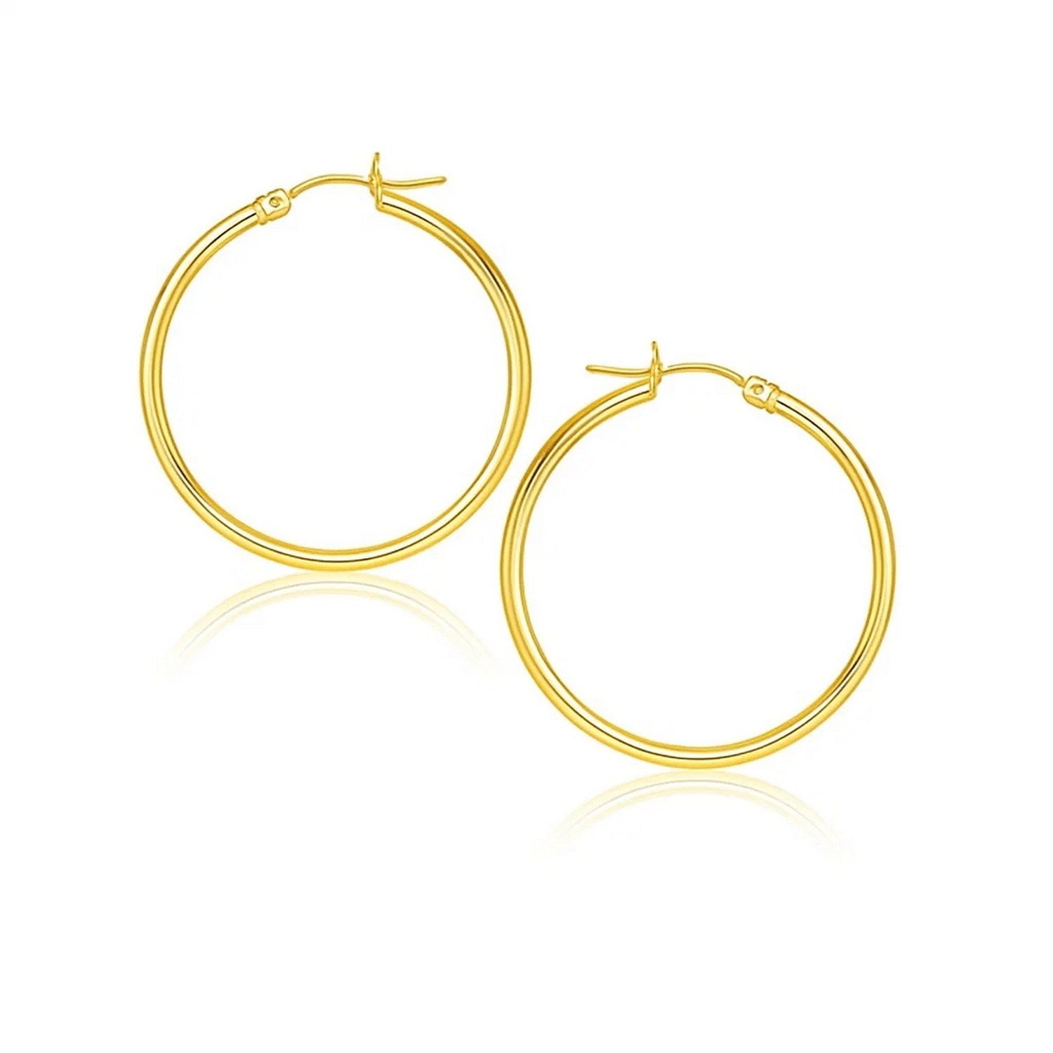 14k gold polished hoop earrings with a modern design, perfect for elevating any luxury jewelry collection.