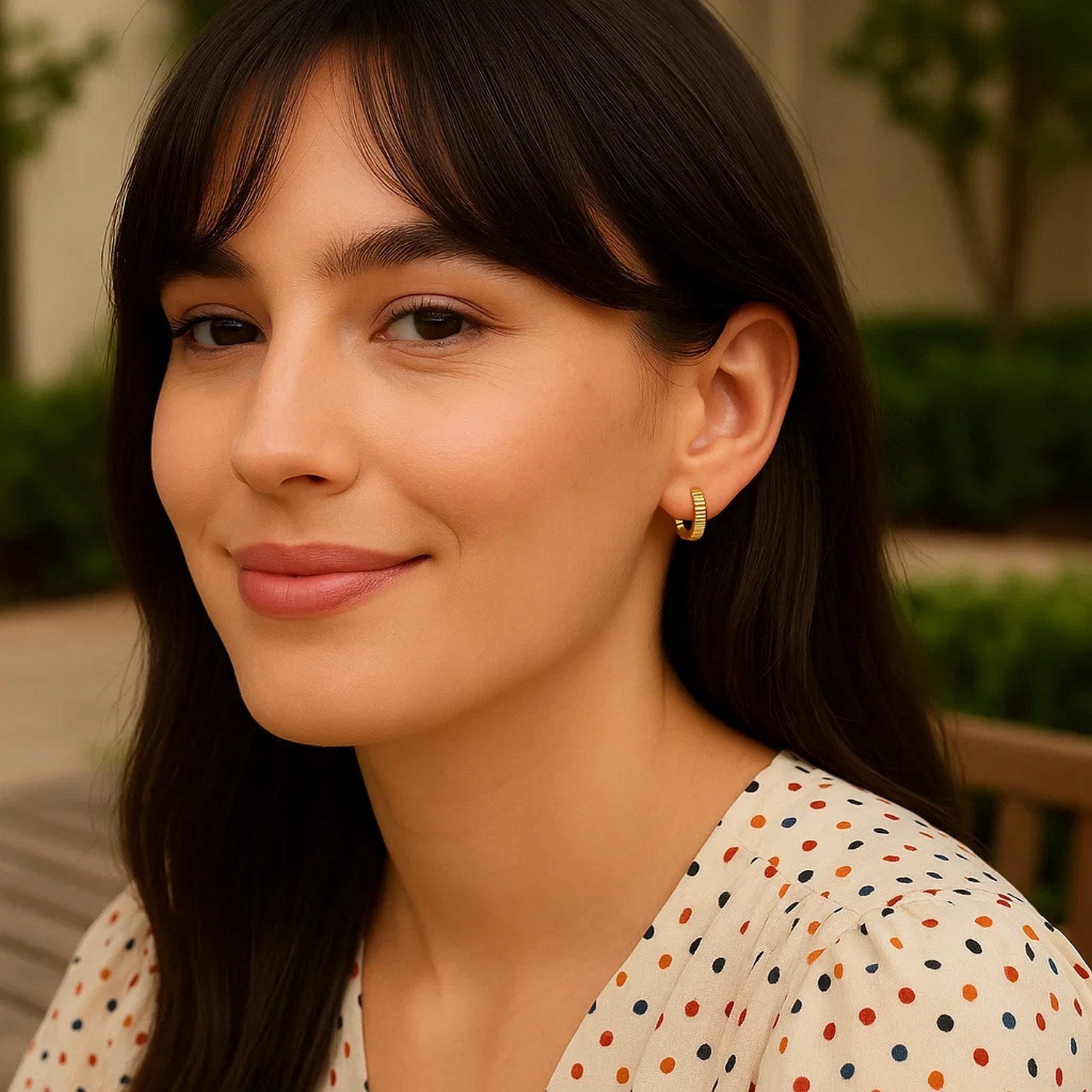 14k yellow gold textured petite round hoop earrings with modern design, perfect for elegant everyday wear.