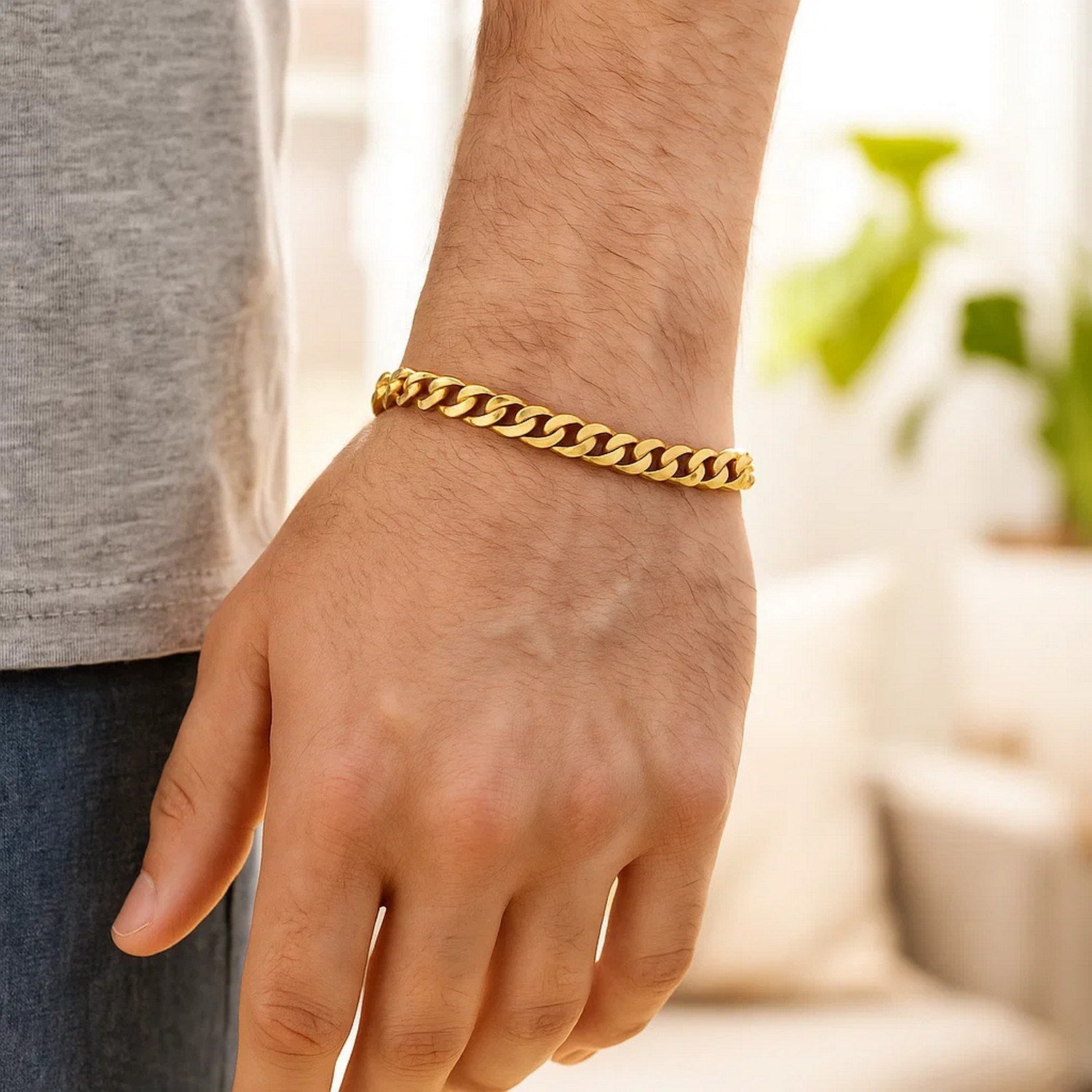 14k yellow gold polished Miami Cuban chain bracelet featuring classic link design, 6.50 mm width for timeless elegance.