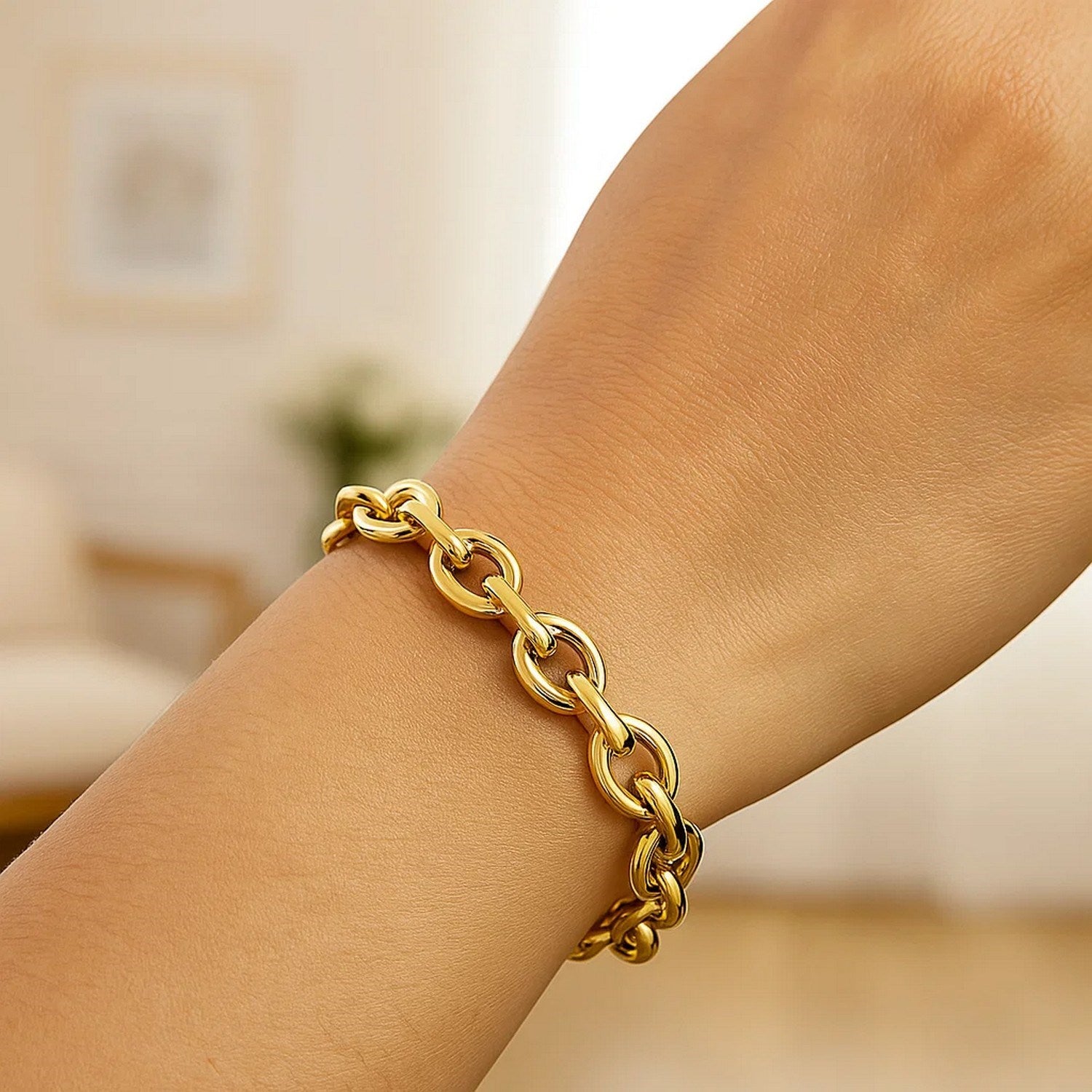 14k yellow gold polished cable link bracelet showcasing modern elegance and refined craftsmanship.