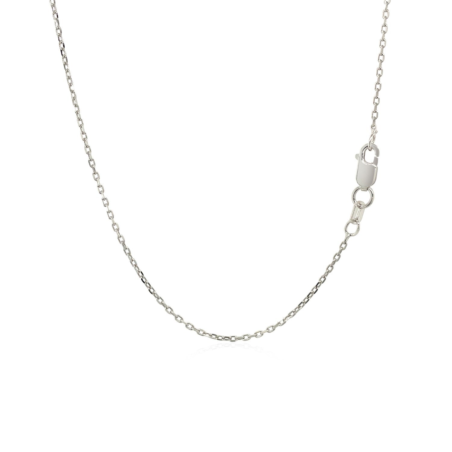 Narrow sterling silver cross pendant adorned with shimmering diamonds, featuring a modern design and elegant chain.