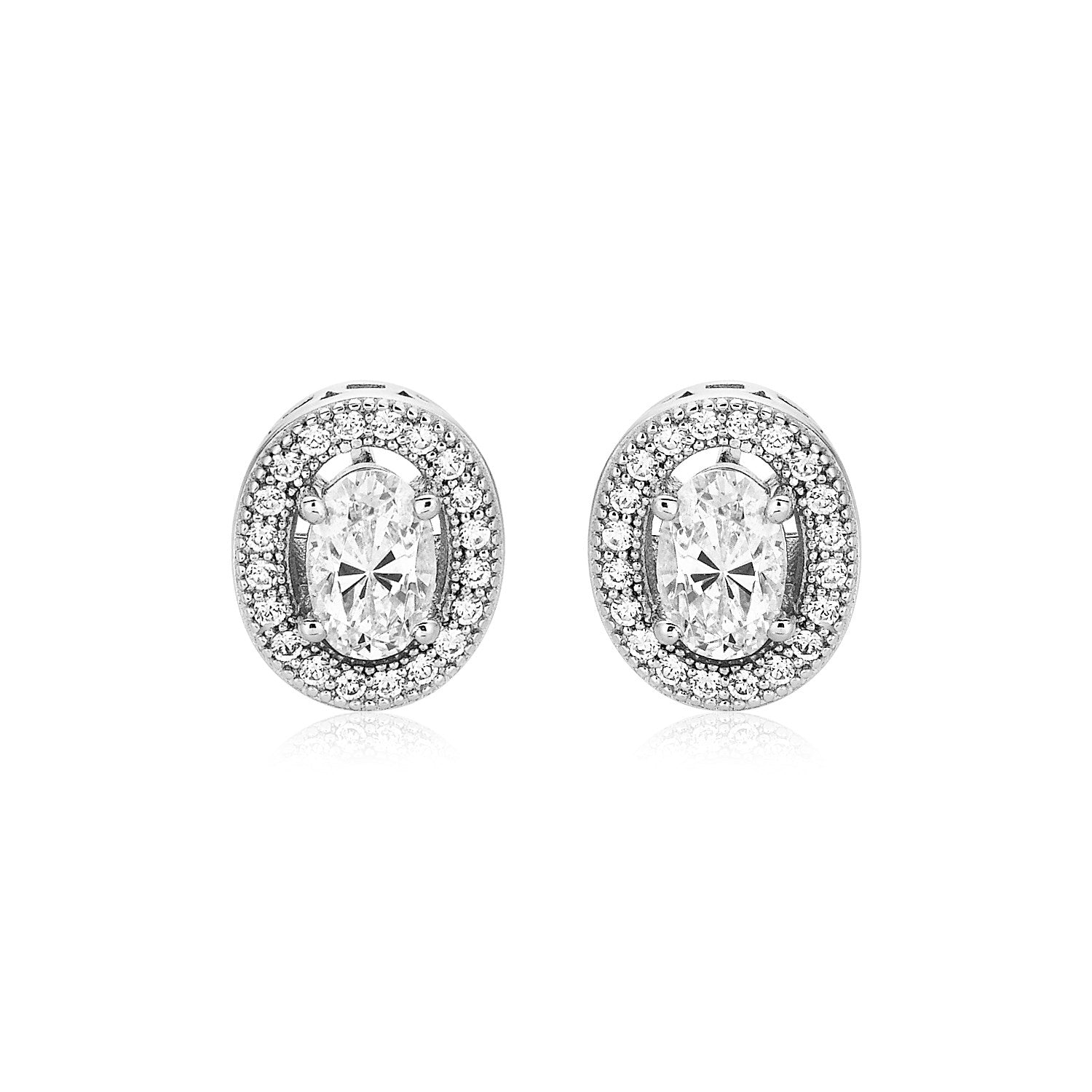 Sterling silver oval earrings featuring bezel-set cubic zirconia for a modern, elegant look.