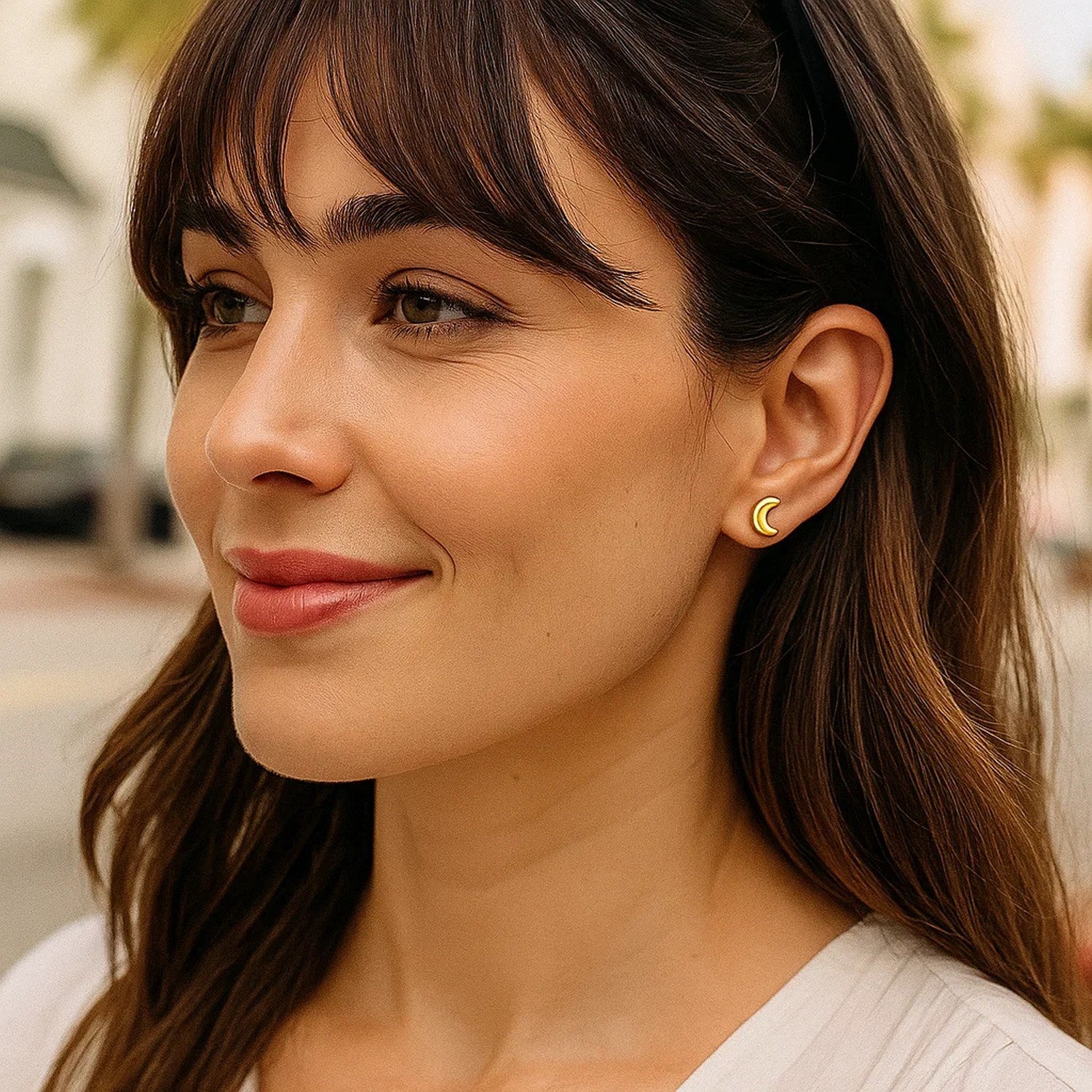 14k yellow gold minimalist moon post earrings, elegantly crafted for a luxurious touch to any outfit.