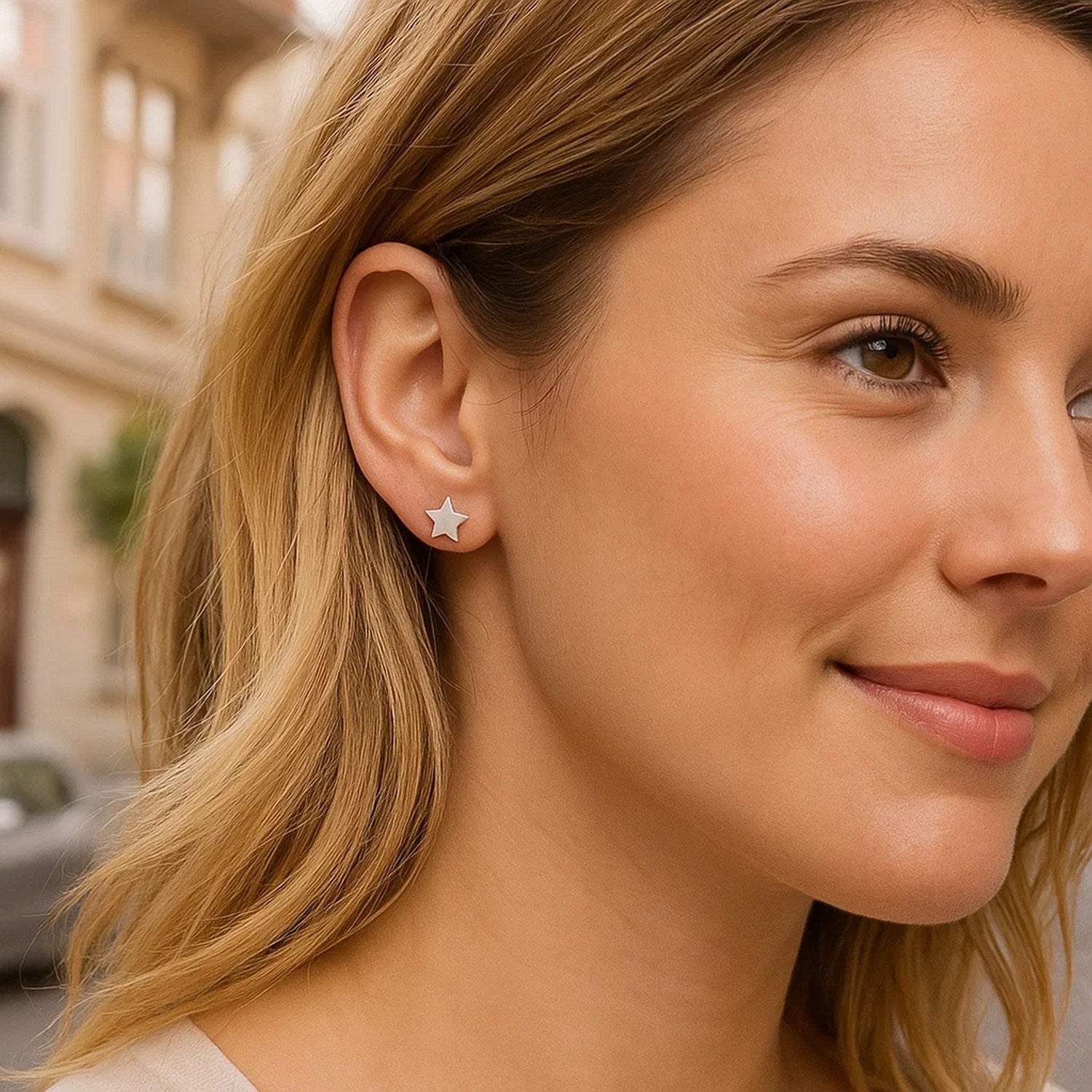 14k white gold star post earrings, modern design, luxurious 6.5mm size, perfect for elegant occasions.