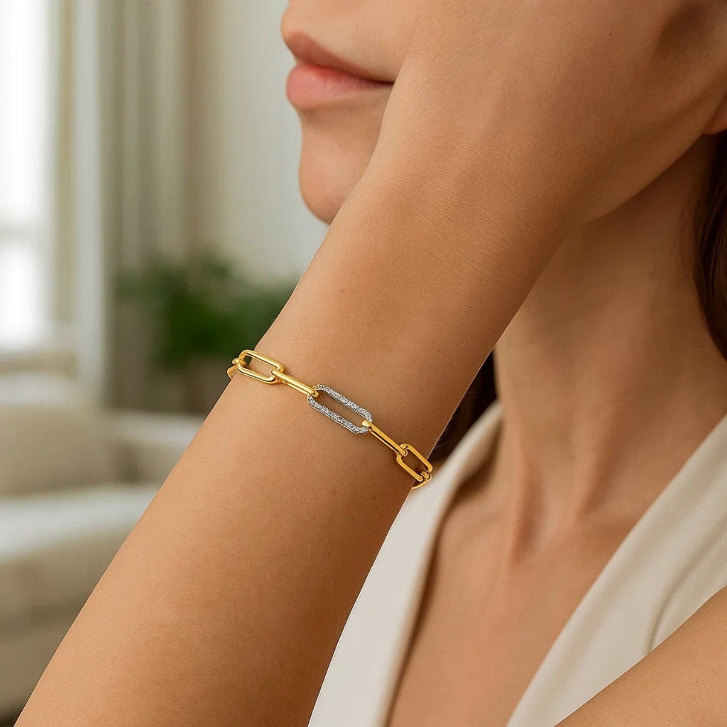 14k yellow gold paperclip chain bracelet featuring three exquisite diamond links, modern elegance for luxury lovers.