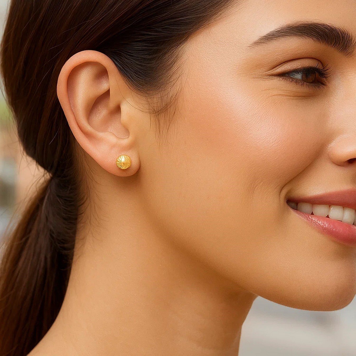 14k yellow gold textured stud earrings with an elegant finish, showcasing modern luxury and exquisite craftsmanship.