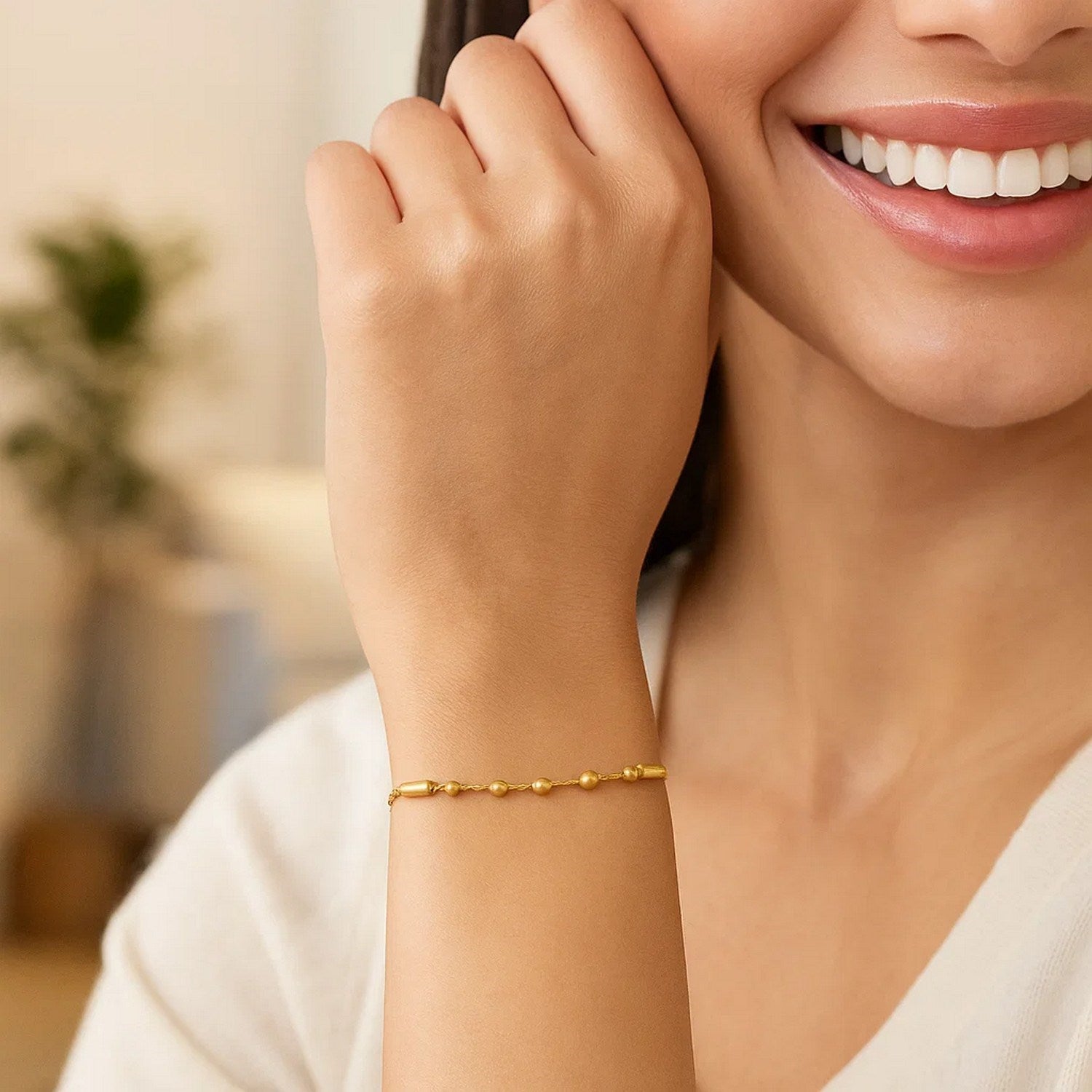 14k yellow gold adjustable bead link bracelet with a modern design, perfect for layering or standalone elegance.