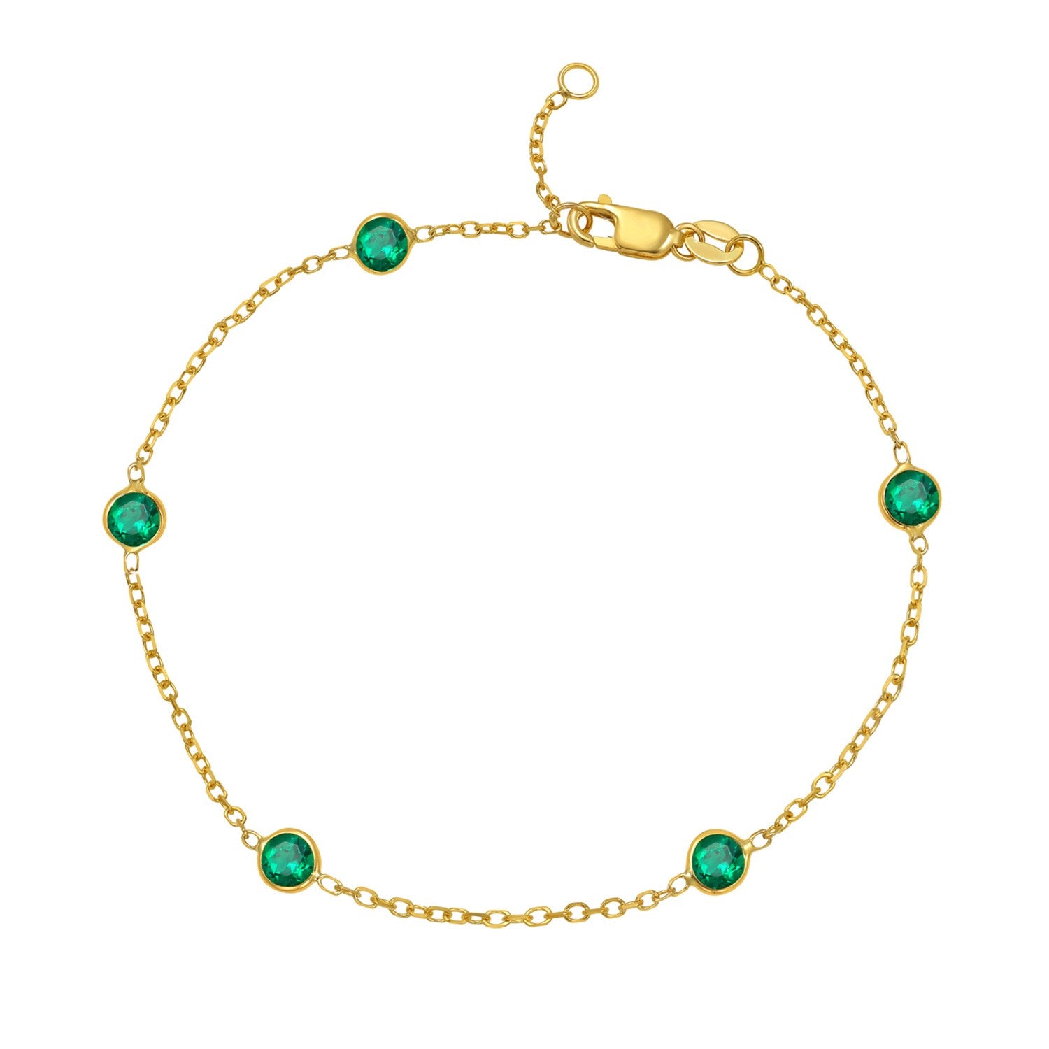 14k yellow gold emerald station bracelet featuring modern chain design and vibrant emerald accents.